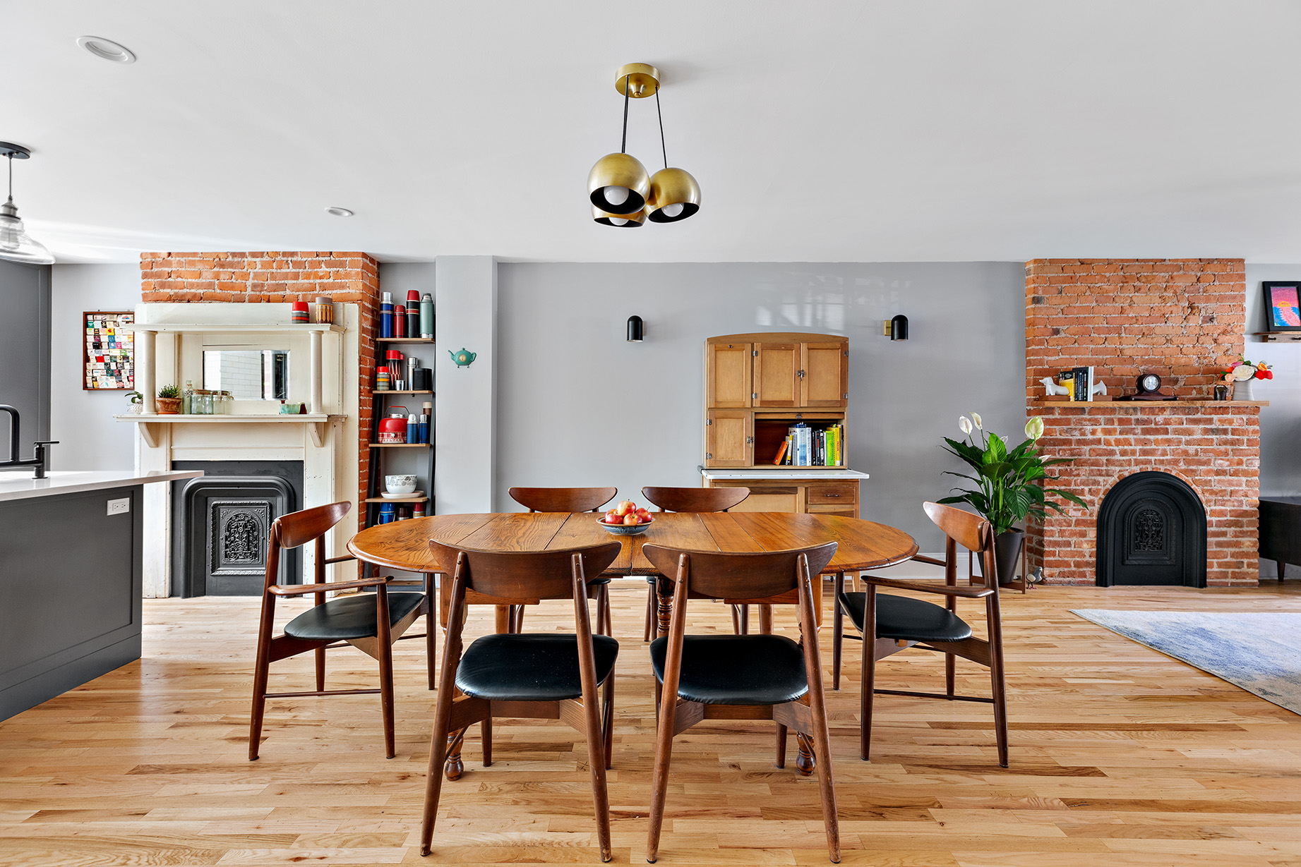 232 Monroe Street Brooklyn, NY 11216 - Photo 1 of 21 a livingroom with fireplace dining area and a couch