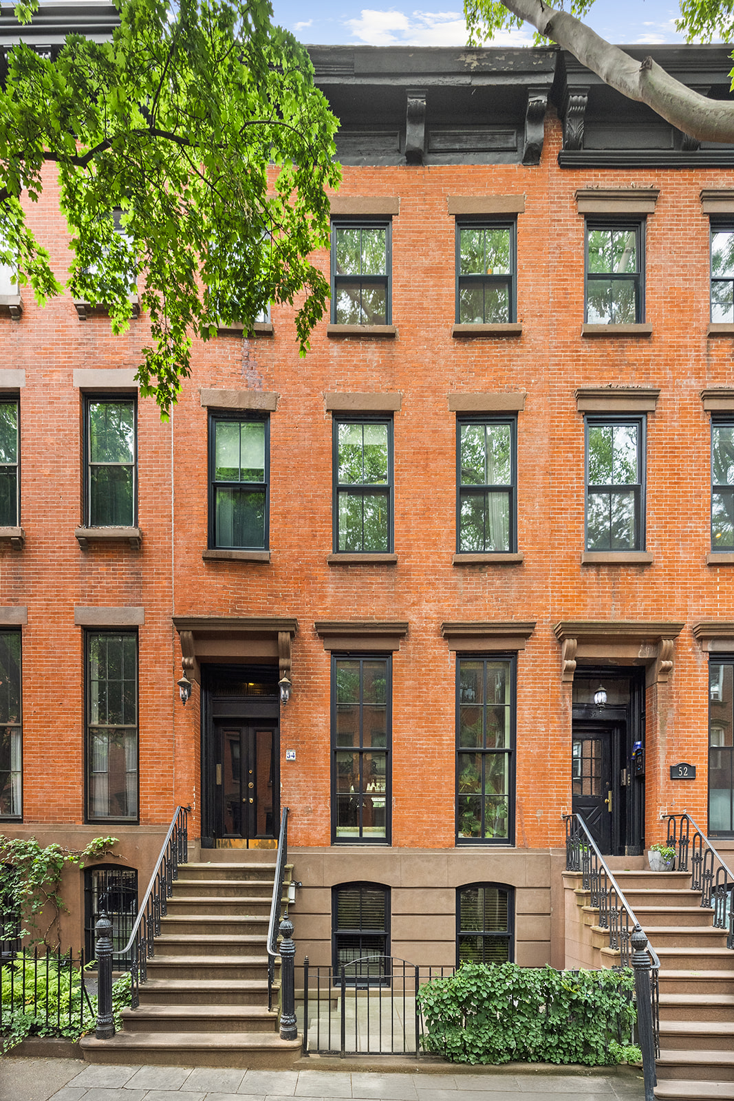 a front view of a multi story residential apartment building
