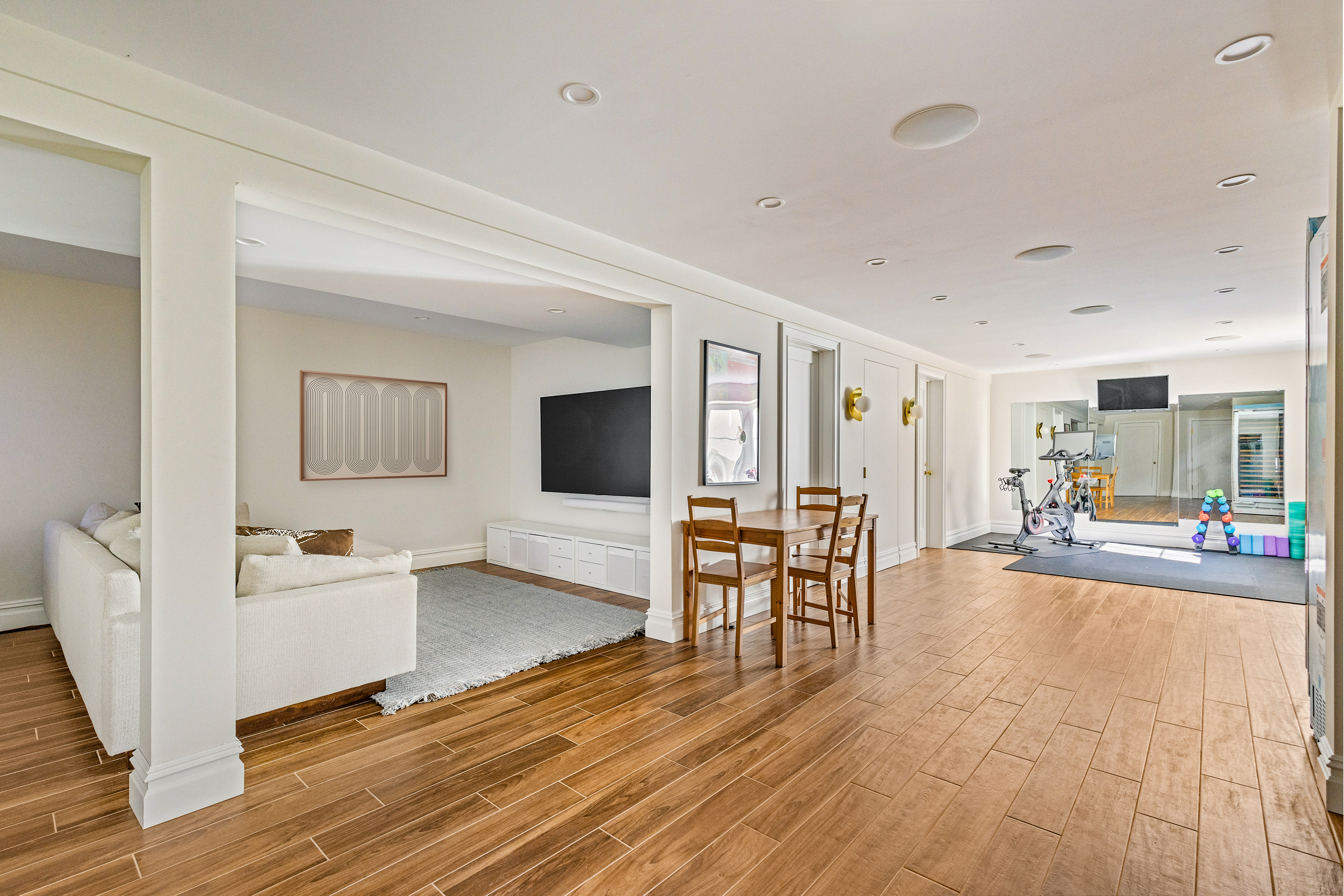 689 East 17th Street Brooklyn, NY 11230 - Photo 26 of 28 a living room with furniture and a flat screen tv