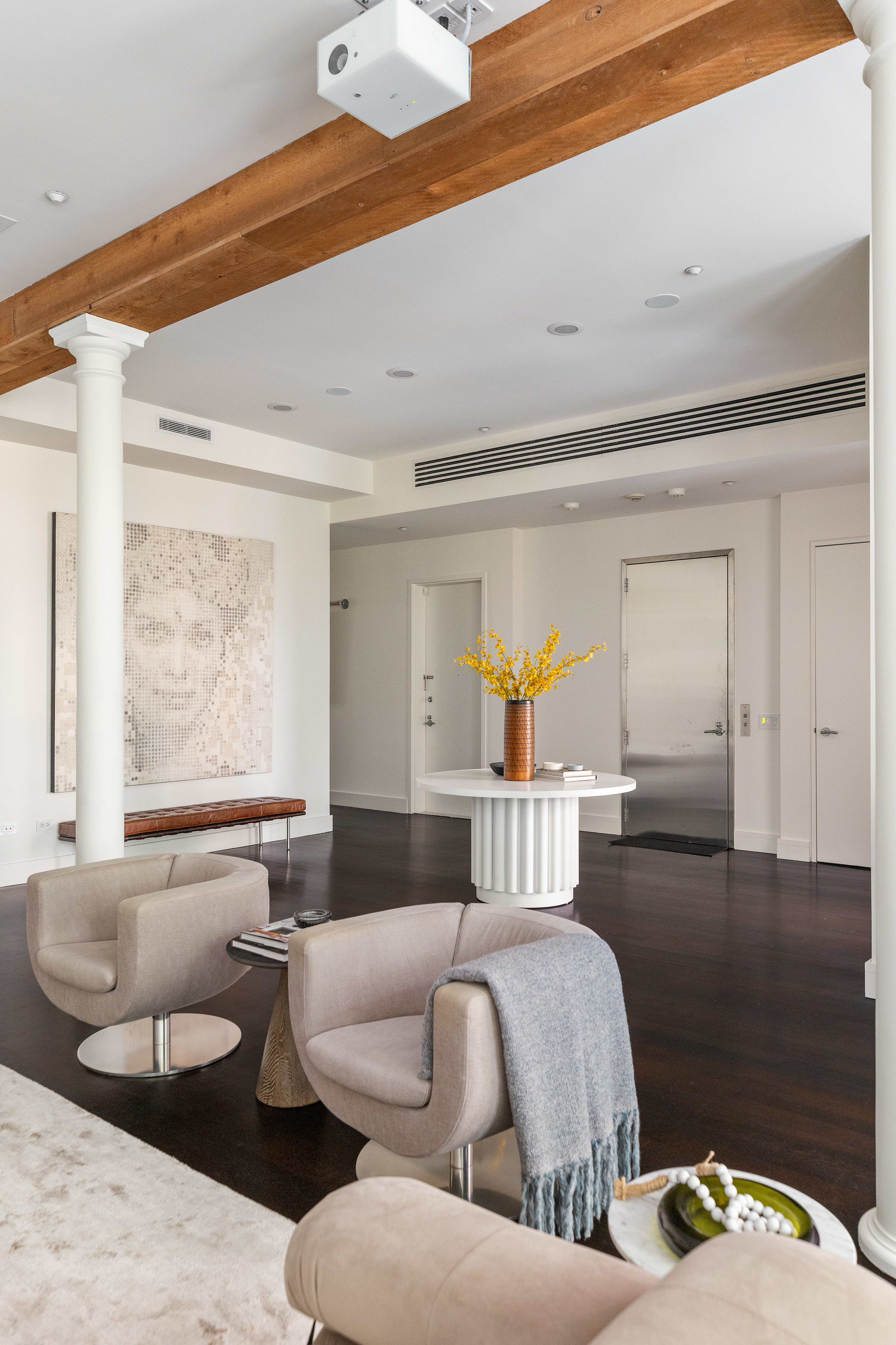388 West Broadway, Unit 2 Manhattan, NY 10012 - Photo 4 of 27 a living room with furniture and a large window
