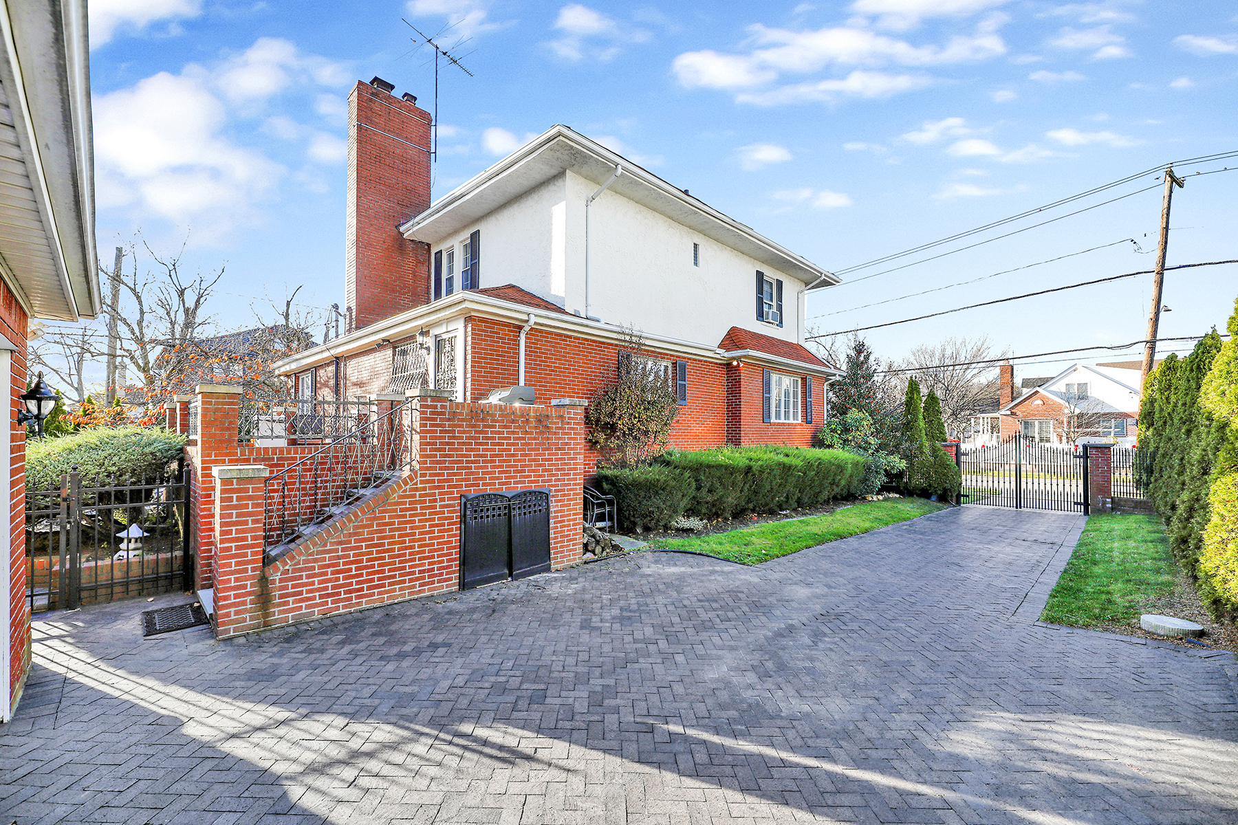 142-15 Newport Avenue Queens, NY 11694 - Photo 43 of 72 a view of a blue house with a yard and plants