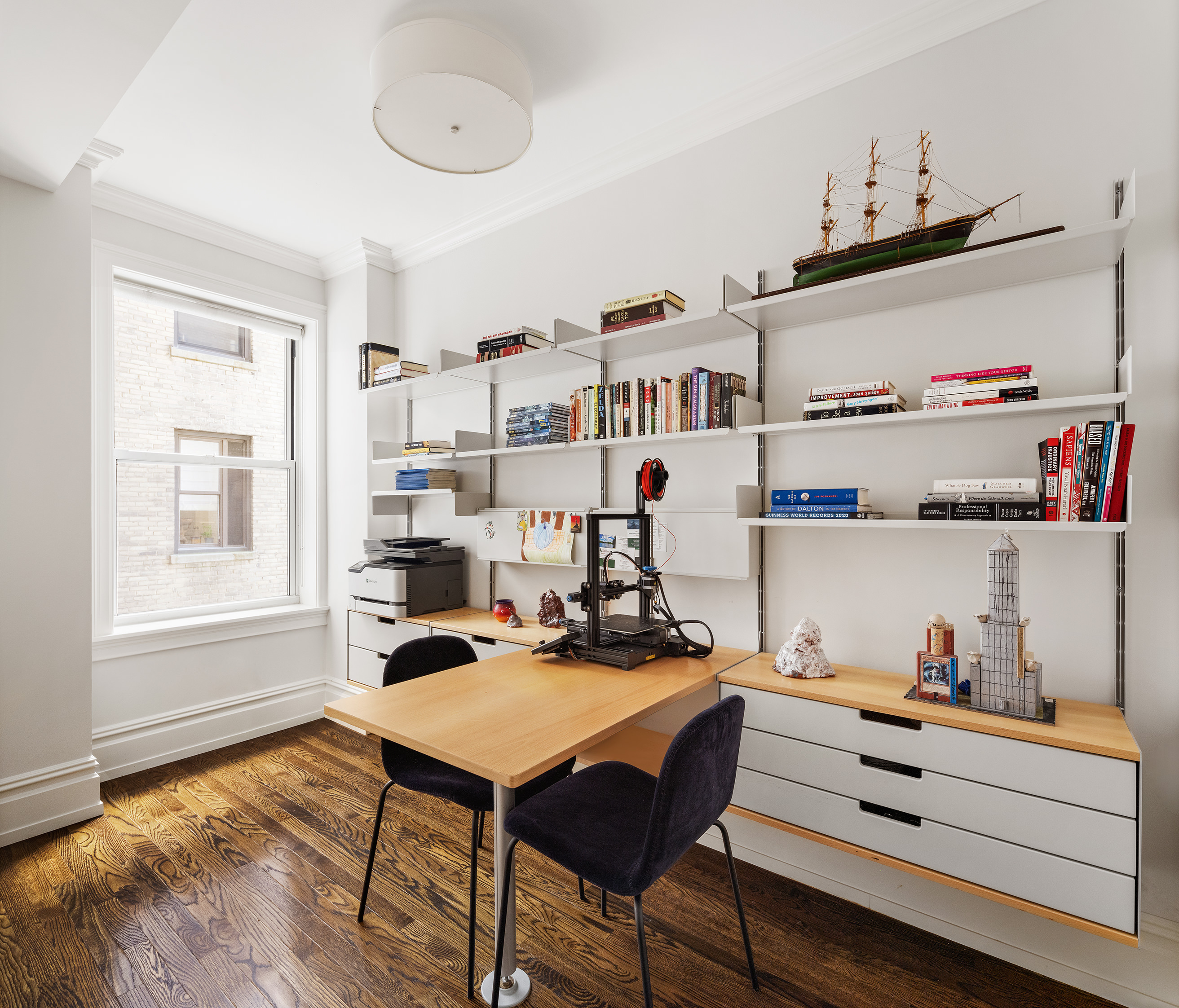 165 West 91st Street, Unit 9AB Manhattan, NY 10024 - Photo 16 of 24 a workspace with furniture window and wooden floor