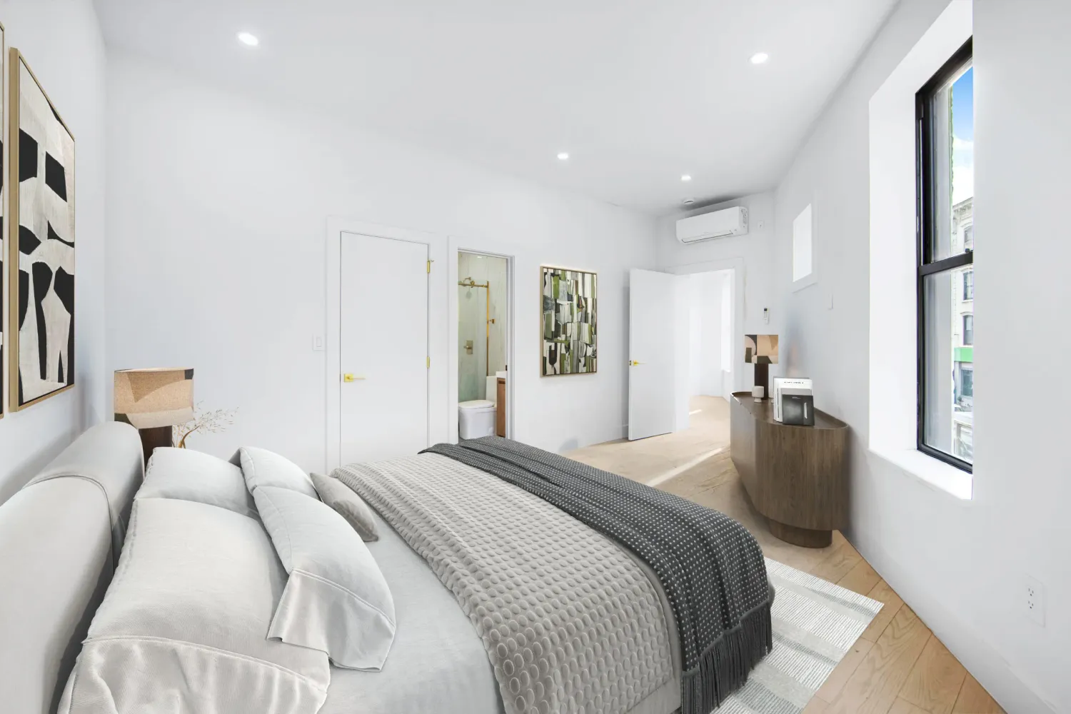 a bedroom with a bed and a couch