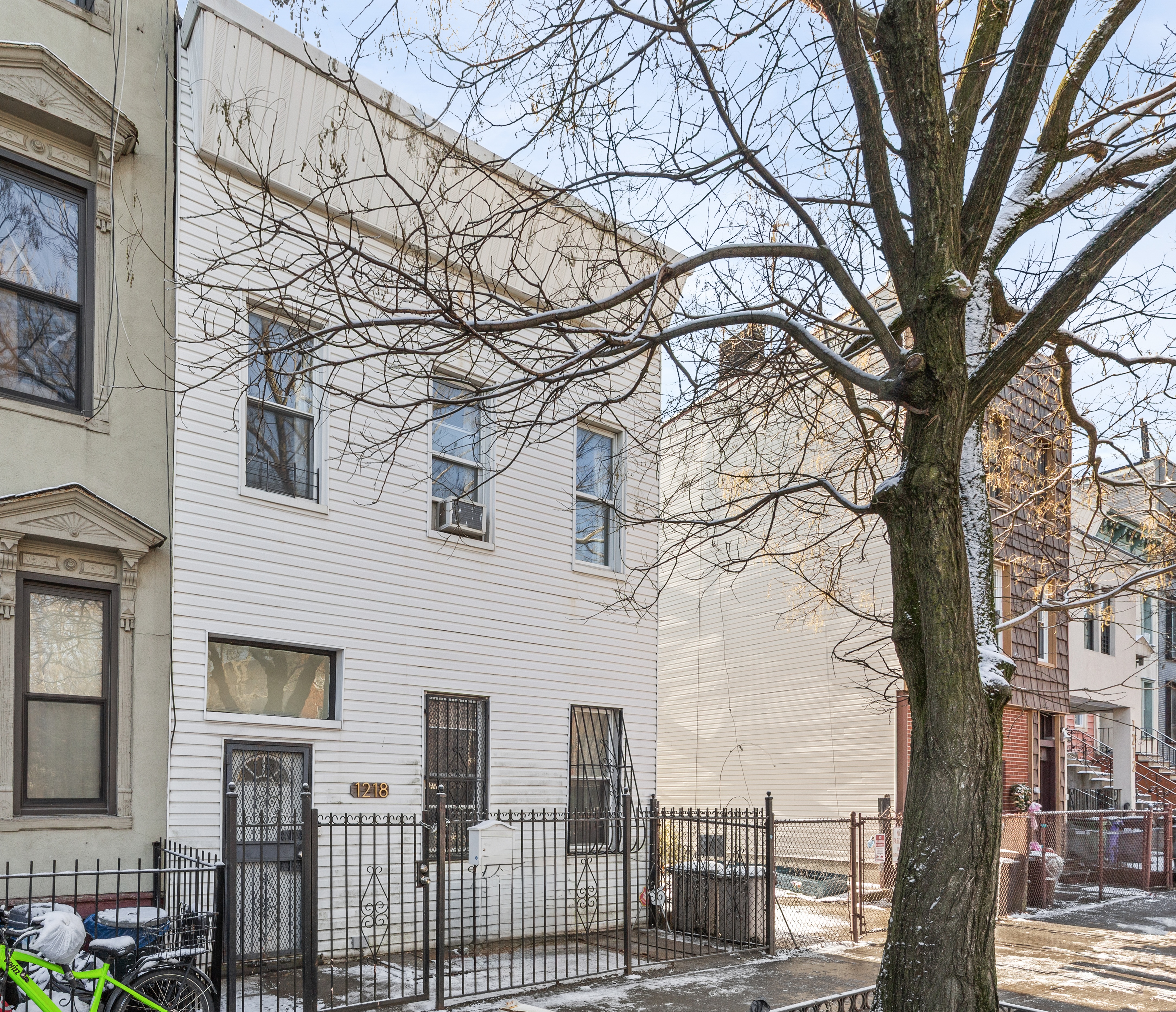 1218 Saint Marks Avenue Brooklyn, NY 11213 - Photo 37 of 42 a view of a house with a trees
