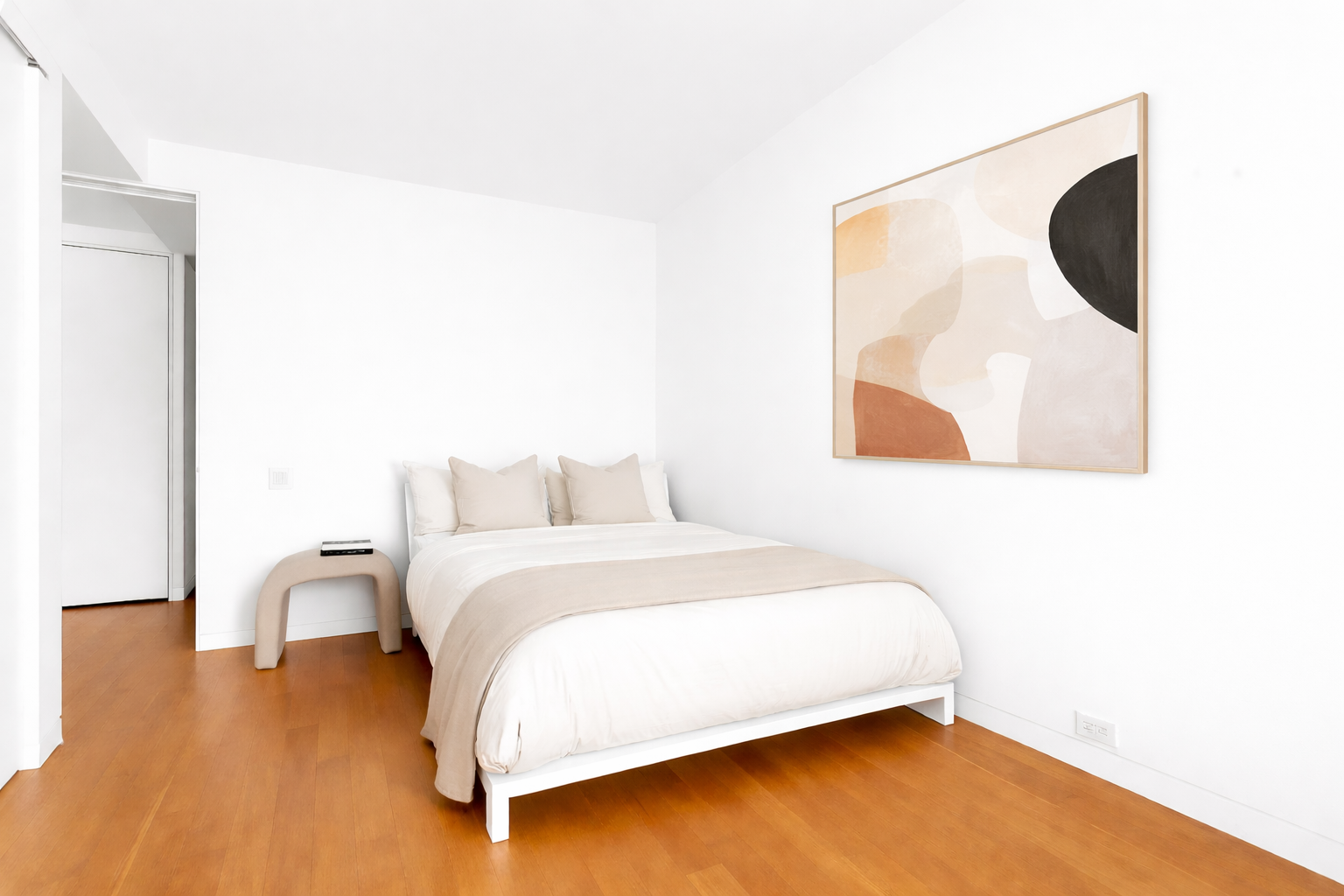 1 Grand Army Plaza, Unit 5E Brooklyn, NY 11238 - Photo 5 of 21 a bedroom with a bed and a painting on the wall