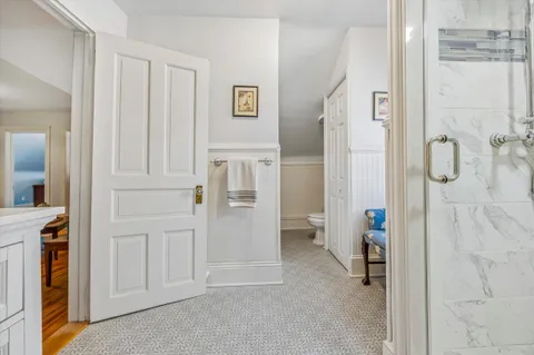 a room with furniture and screen