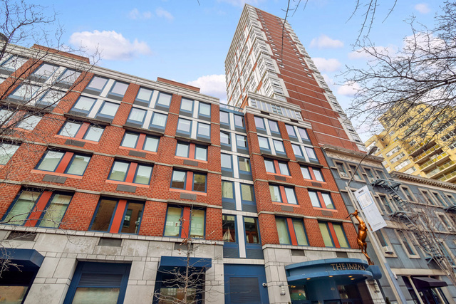 404 East 76th Street, Unit 4M Manhattan, NY 10021 - Photo 12 of 13 a view of a large building