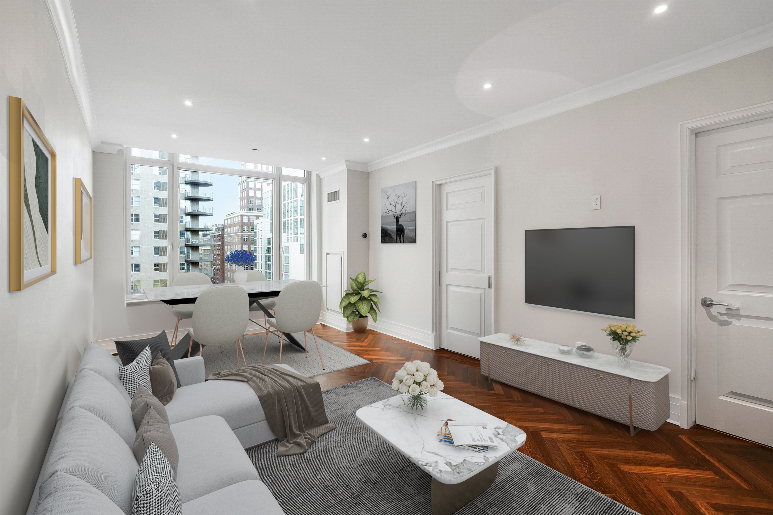 a living room with furniture and a flat screen tv