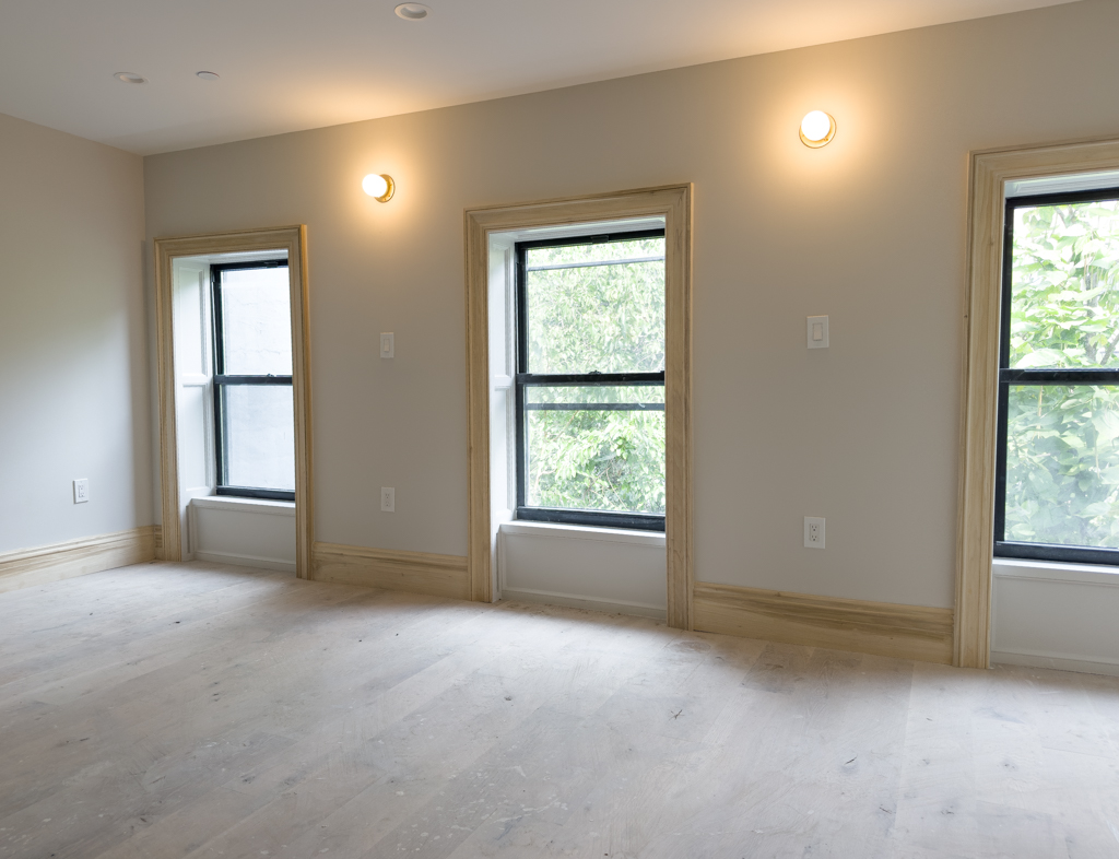 795 Quincy Street Brooklyn, NY 11221 - Photo 10 of 17 an empty room with windows and closet