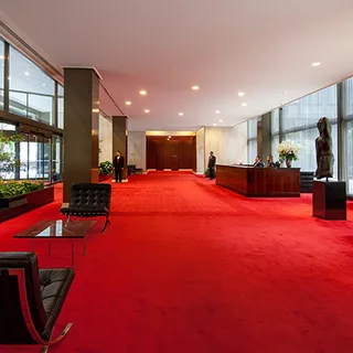 a large room with furniture and a flat screen tv