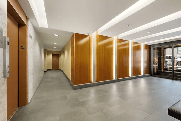 13 West 13th Street, Unit 2DS Manhattan, NY 10011 - Photo 13 of 19 a view of a hallway with wooden floor