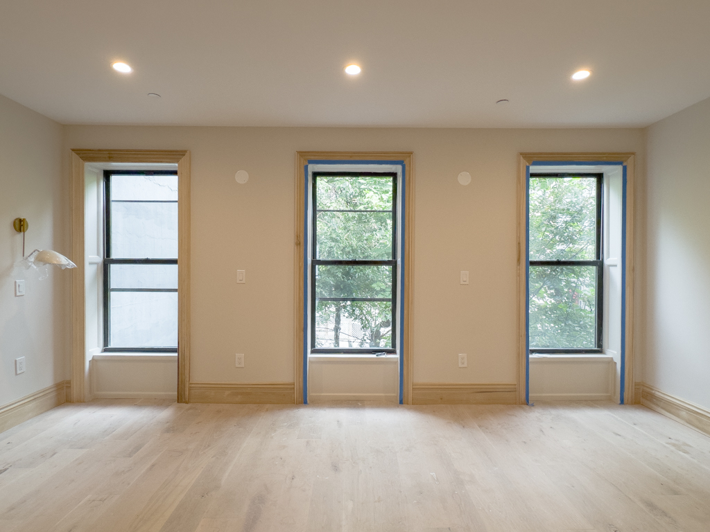 795 Quincy Street Brooklyn, NY 11221 - Photo 5 of 17 an empty room with windows and closet