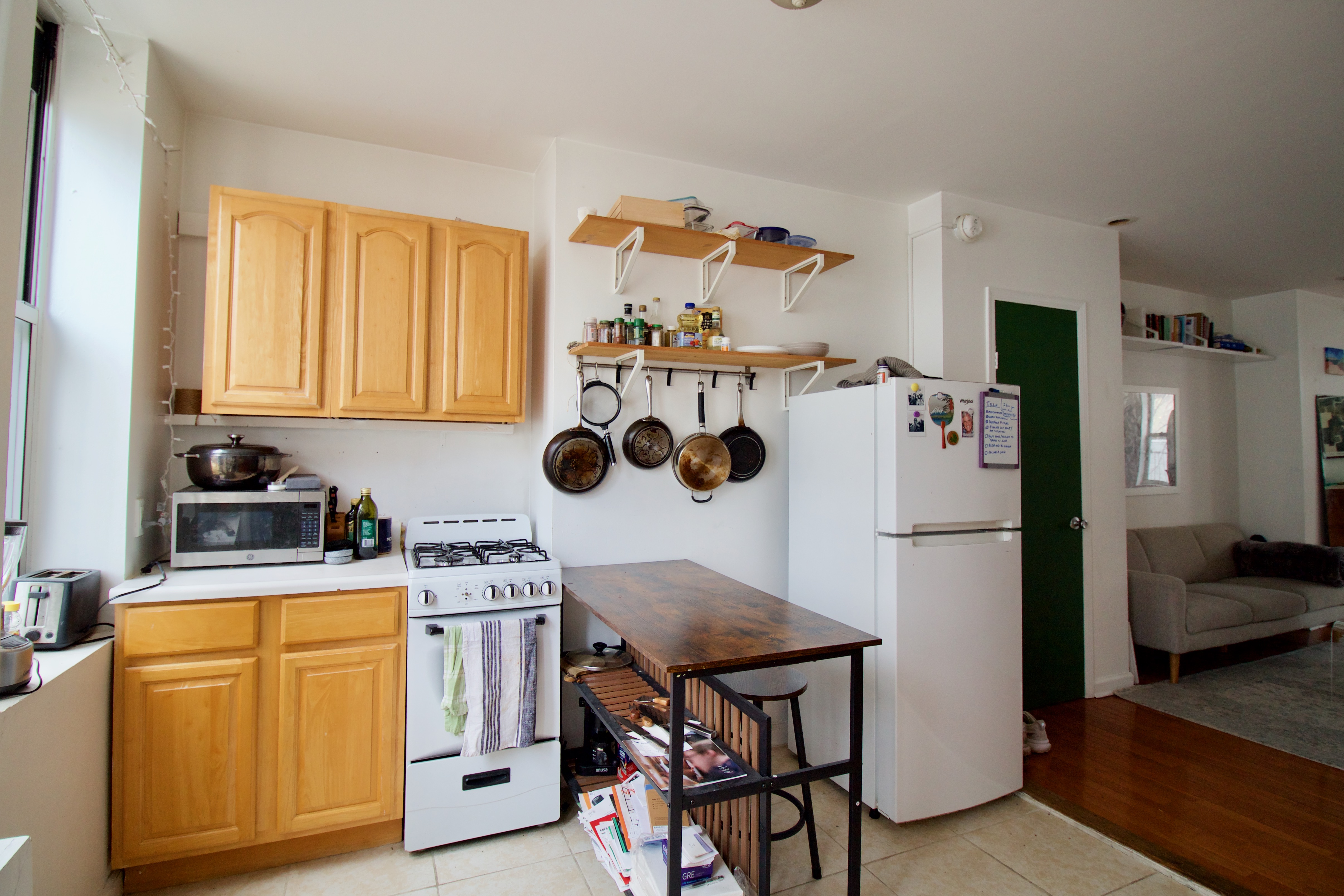 55 Duffield Street, Unit 3 Brooklyn, NY 11201 - Photo 12 of 14 a kitchen with stainless steel appliances a stove a refrigerator and a more cabinets