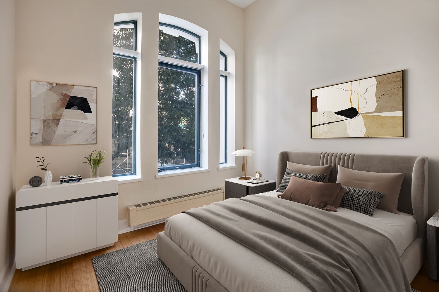 2056 5th Avenue, Unit 2B Manhattan, NY 10035 - Photo 5 of 13 a bedroom with a bed and a large window