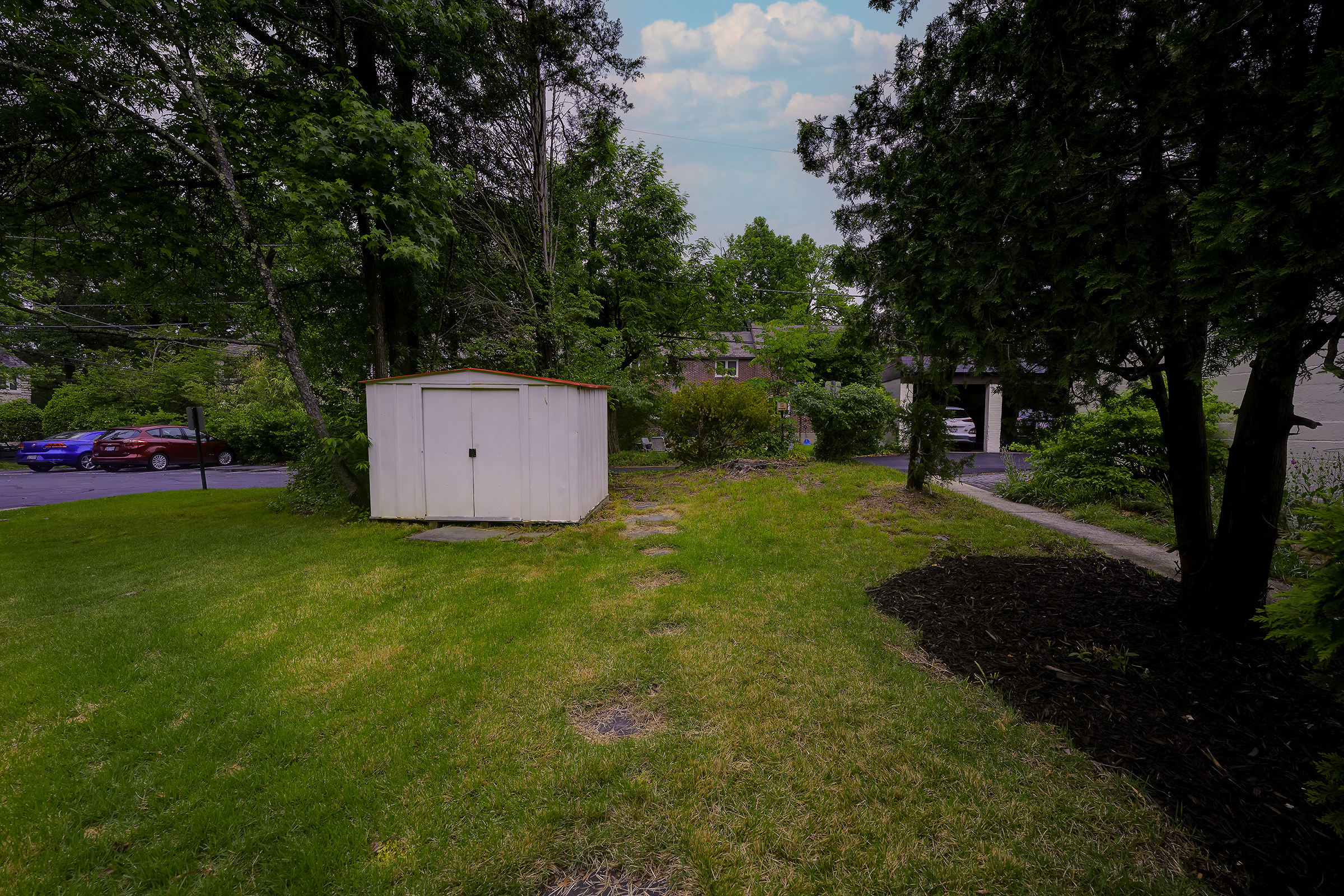 45 D Ridge Road Greenbelt, MD 20770 - Photo 35 of 35 a backyard of a house with lots of green space and garden