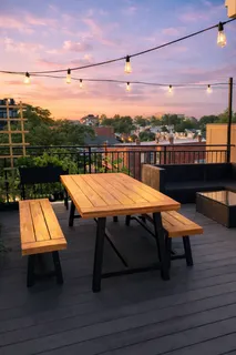 a view of a terrace with outdoor seating