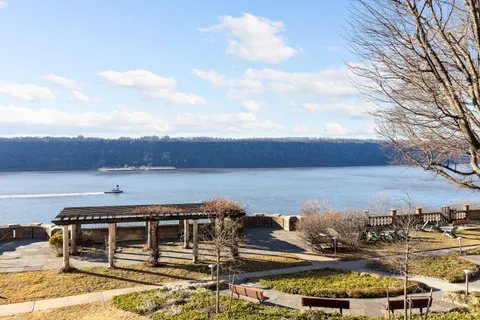 a house view with a lake view