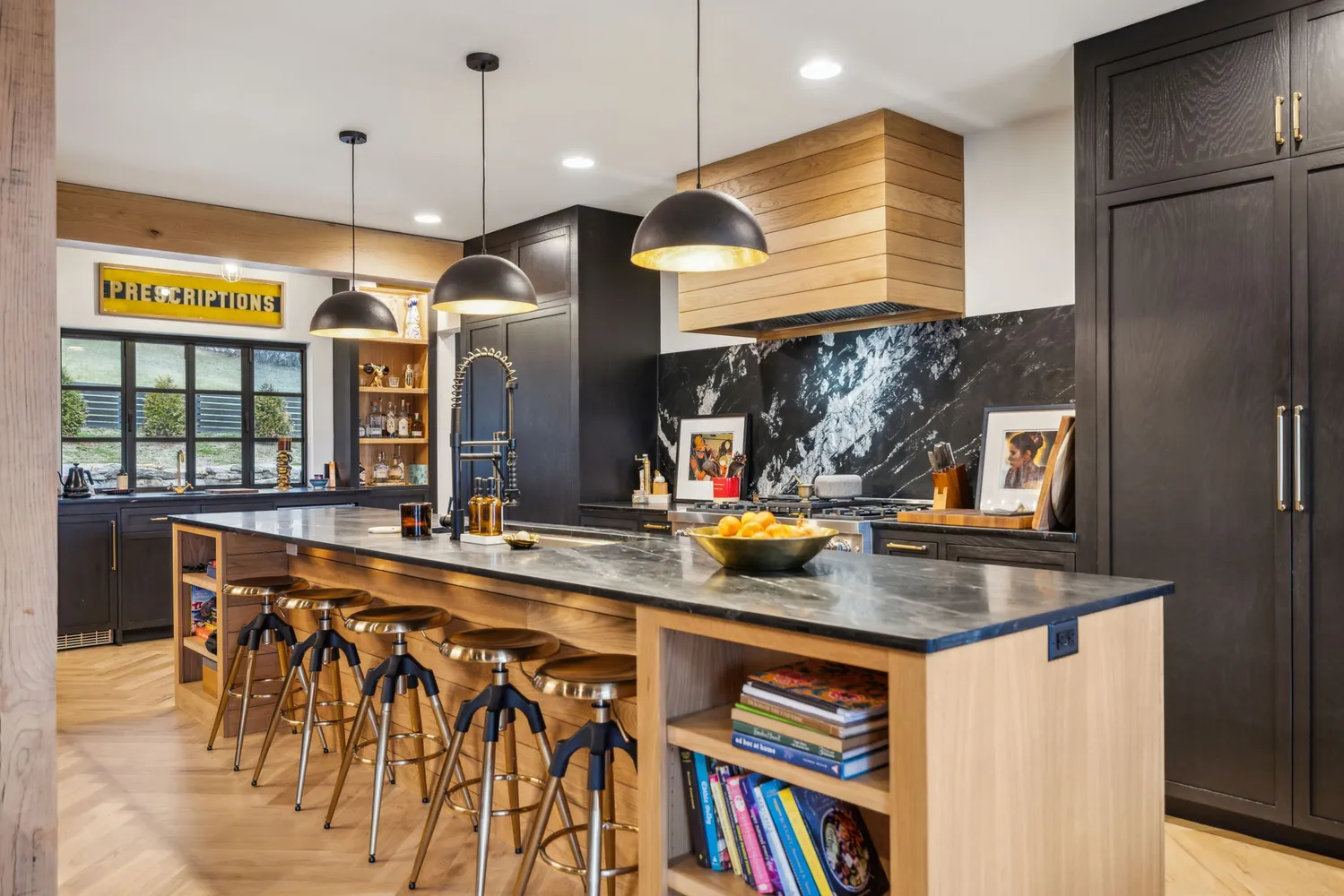 a kitchen with stainless steel appliances granite countertop a sink and a wooden cabinets