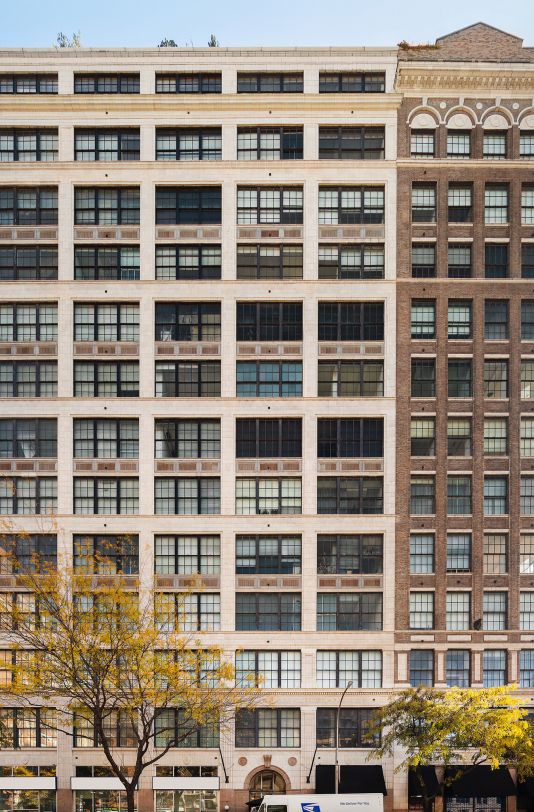 a view of a building with a street
