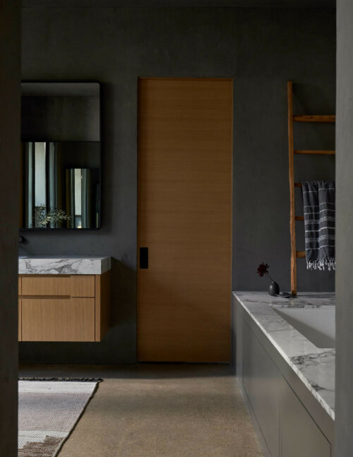 5716 Stonegate Road Dallas, TX 75209 - Photo 15 of 25 a bathroom with a sink and a mirror