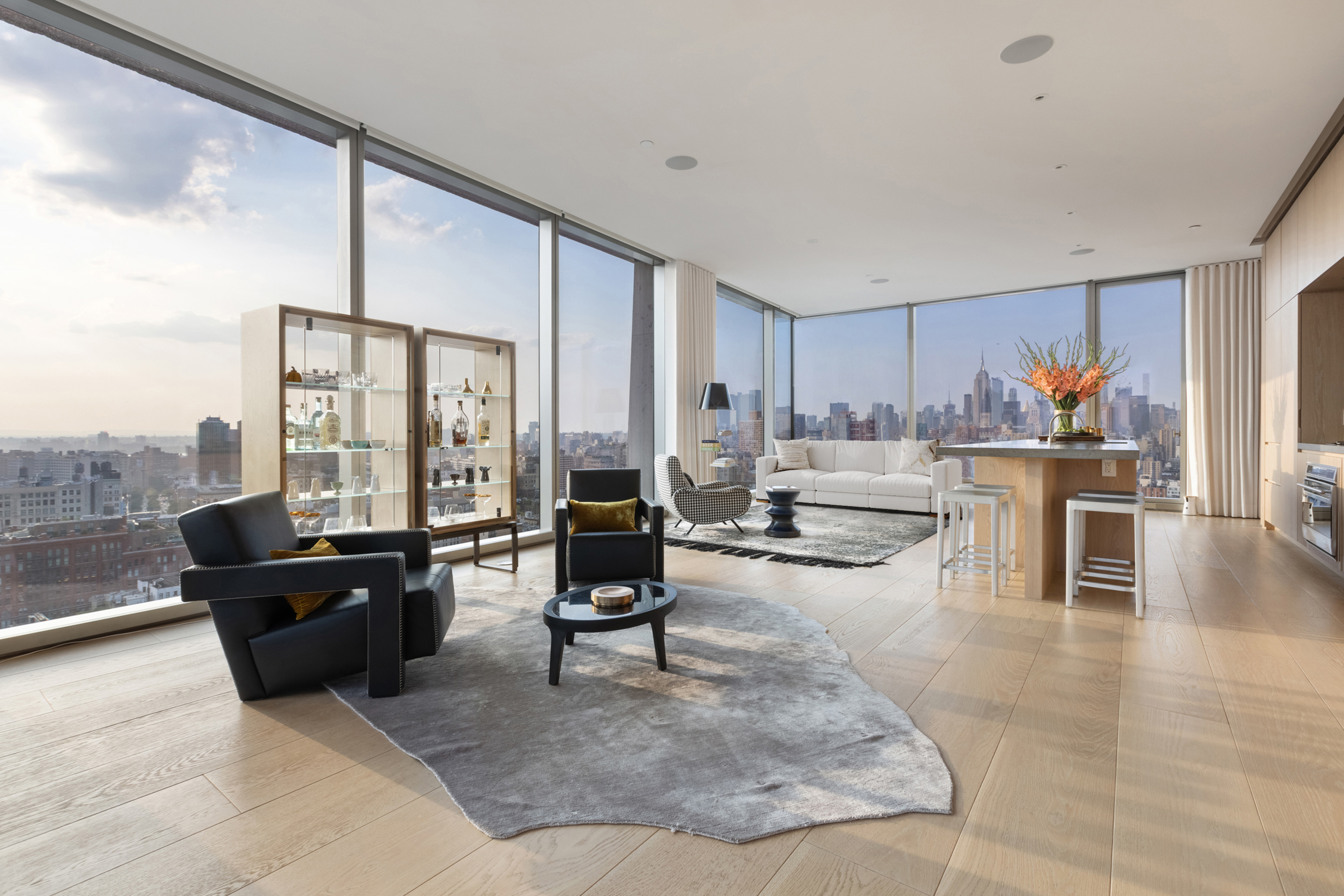 215 Chrystie Street, Unit PH2 Manhattan, NY 10002 - Photo 10 of 30 a living room with fireplace furniture and a large window