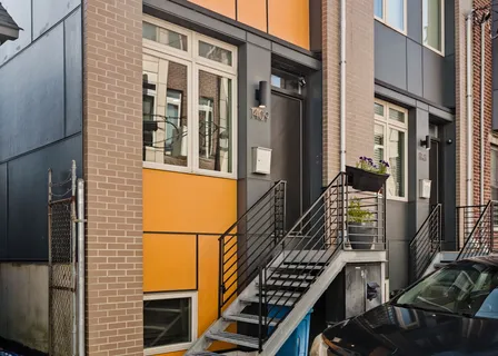 a front view of a building with glass windows