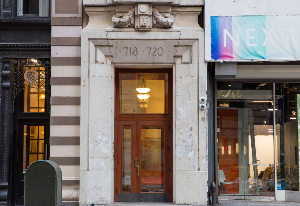 718 Broadway, Unit PHC Manhattan, NY 10003 - Photo 19 of 21 a front view of a building with entryway