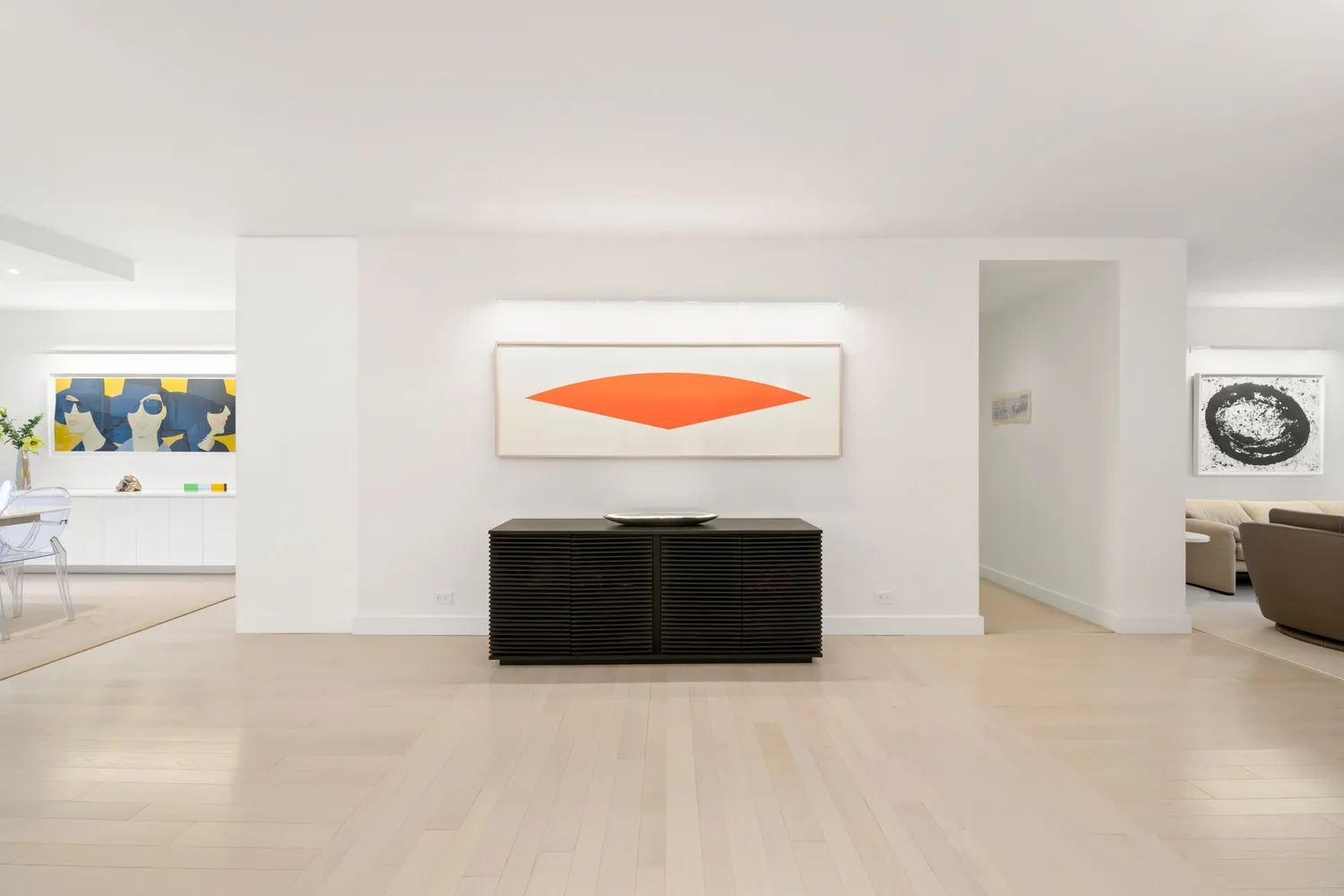 a view of a livingroom with furniture and a fireplace