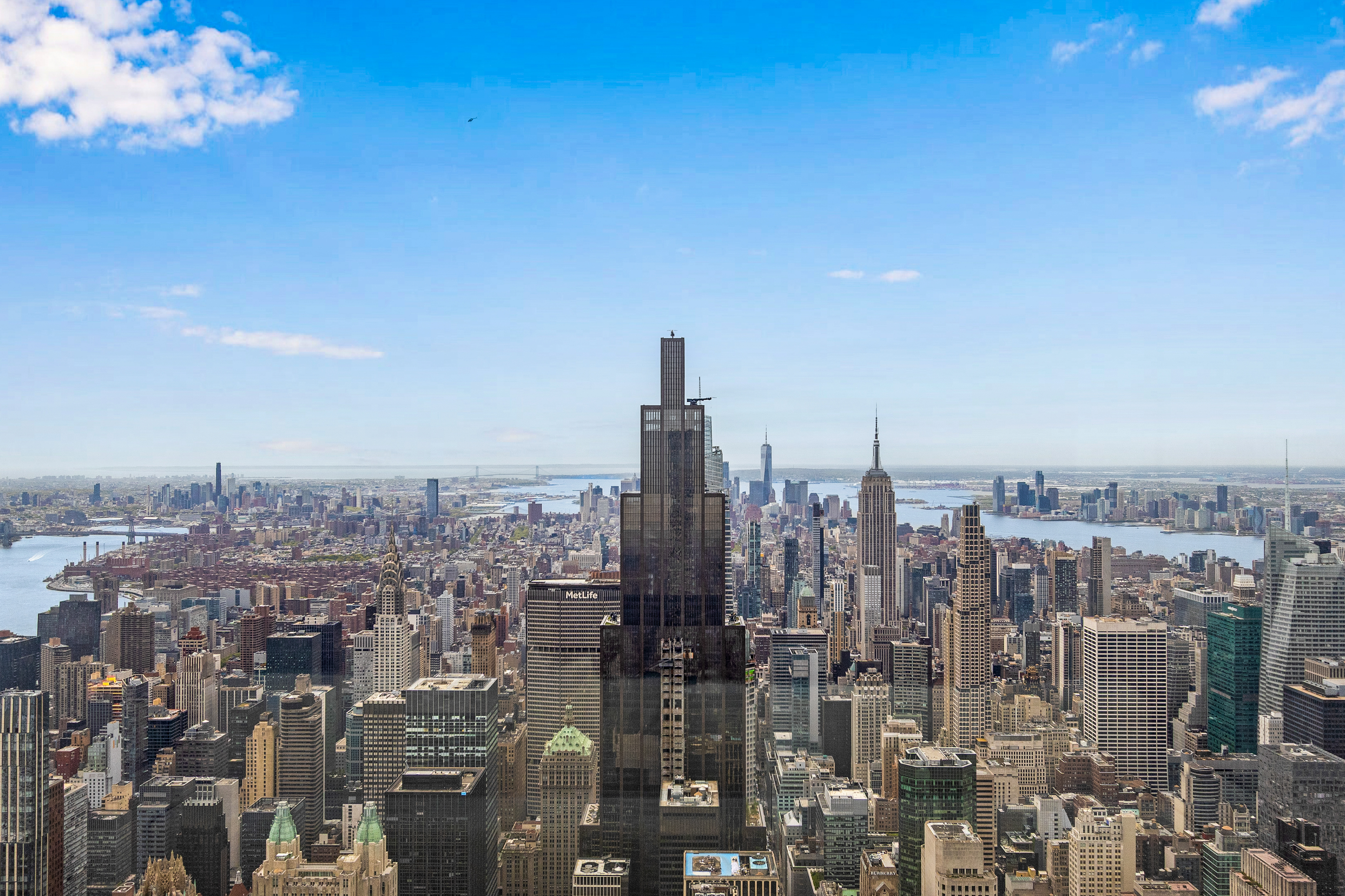 432 Park Avenue, Unit PH88 Manhattan, NY 10022 - Photo 15 of 17 a view of a city with tall buildings