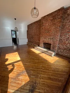 a view of livingroom with kitchen