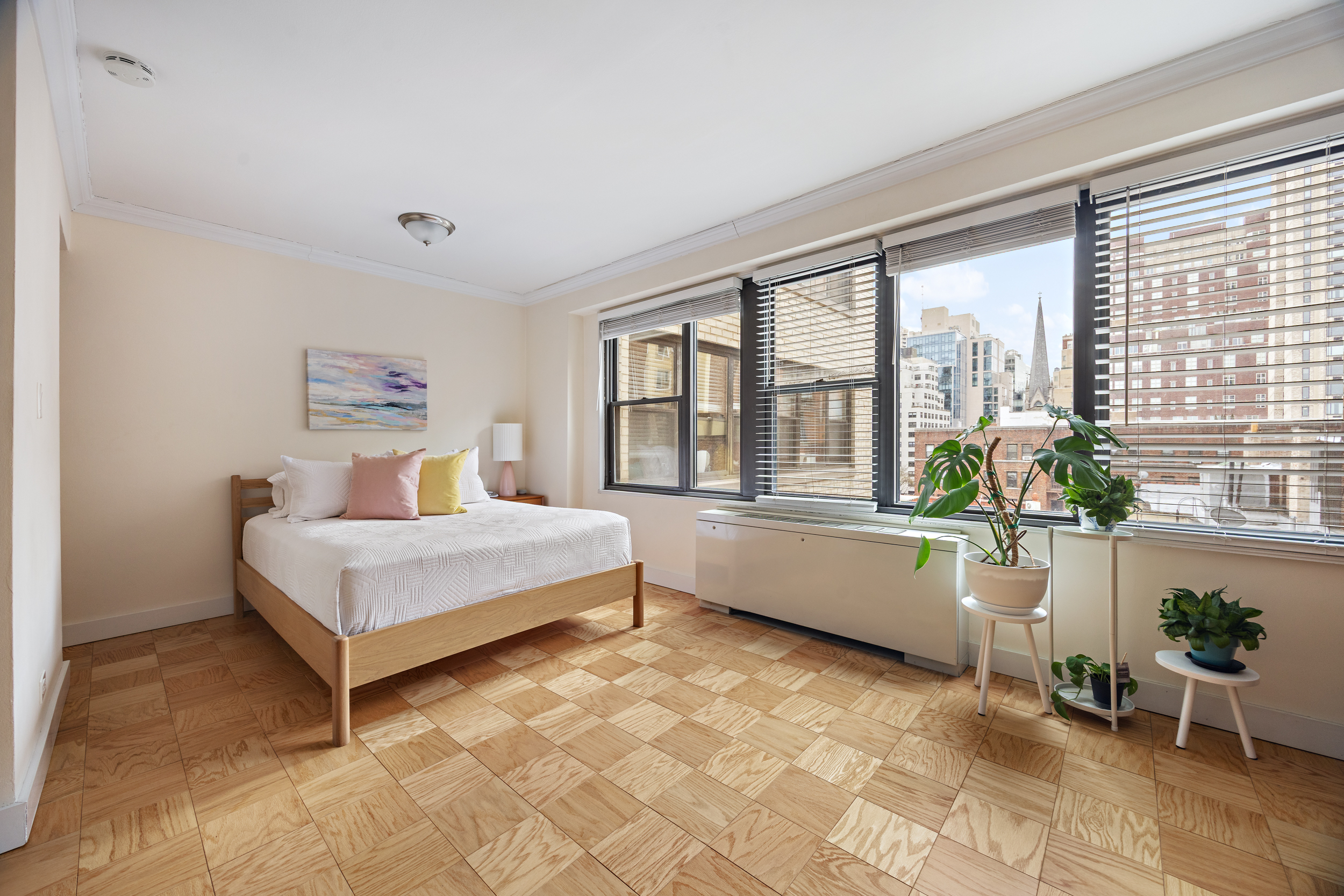 120 East 90th Street, Unit 7A Manhattan, NY 10128 - Photo 4 of 8 a living room with furniture and windows