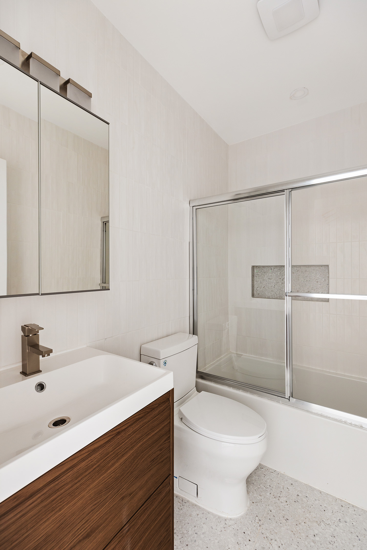 392 5th Avenue, Unit 3A Brooklyn, NY 11215 - Photo 8 of 9 a bathroom with a sink a toilet and shower