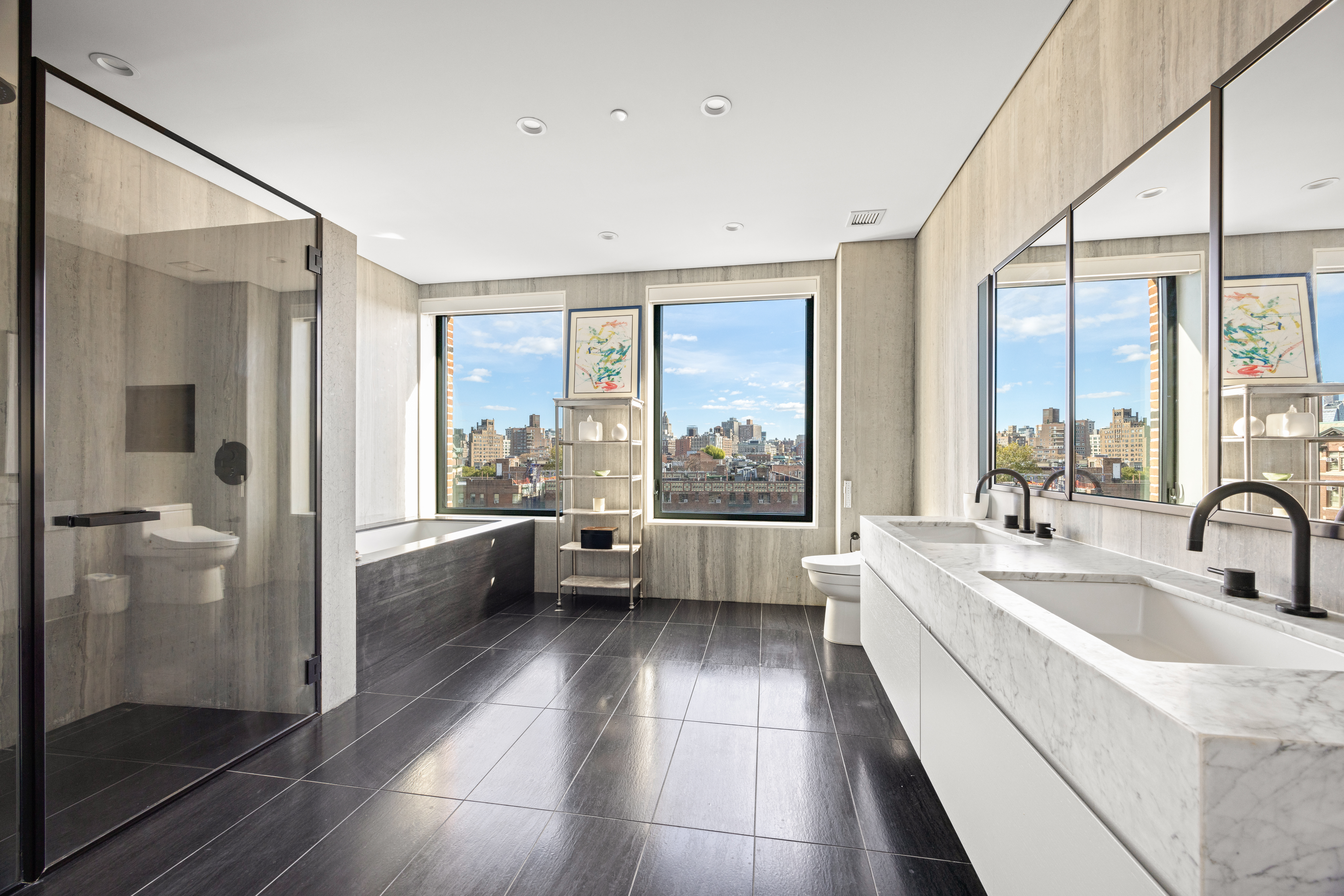 100 Barrow Street, Unit 9A Manhattan, NY 10014 - Photo 8 of 12 a kitchen with a sink and refrigerator with wooden floor