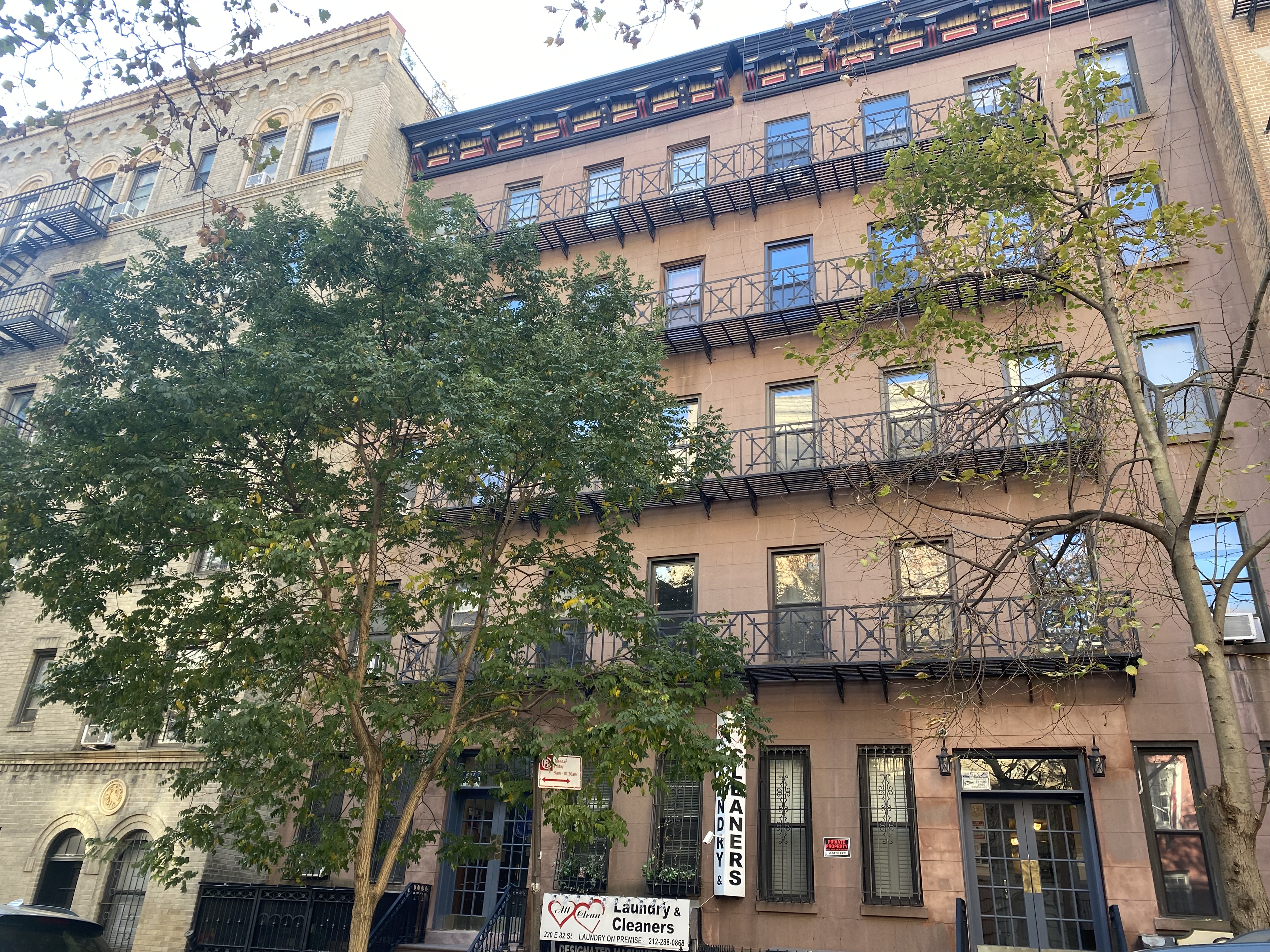 220 East 82nd Street, Unit 4RW Manhattan, NY 10028 - Photo 10 of 11 a view of a building with a tree