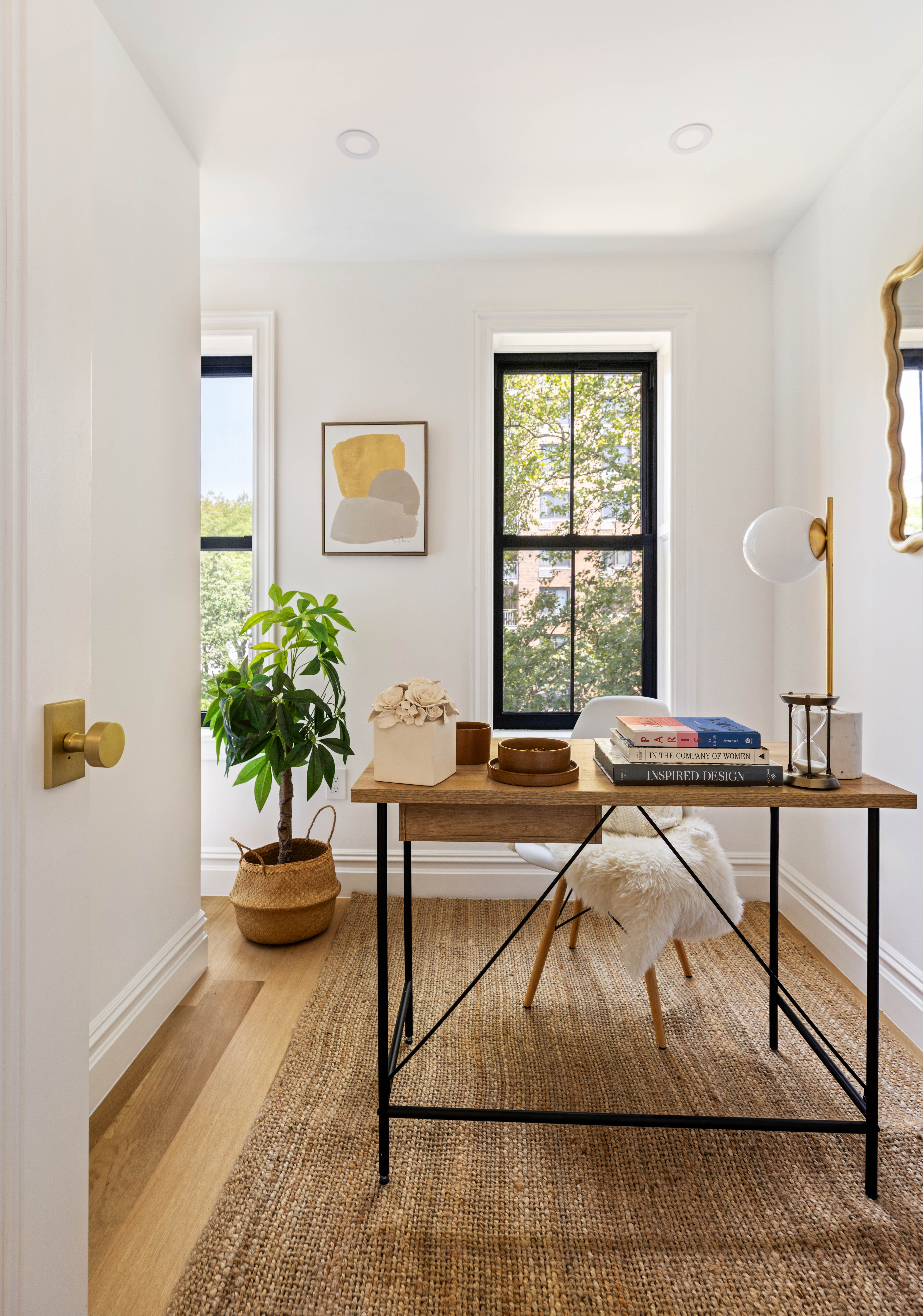 174 Hall Street Brooklyn, NY 11205 - Photo 11 of 14 a living room with furniture and a potted plant