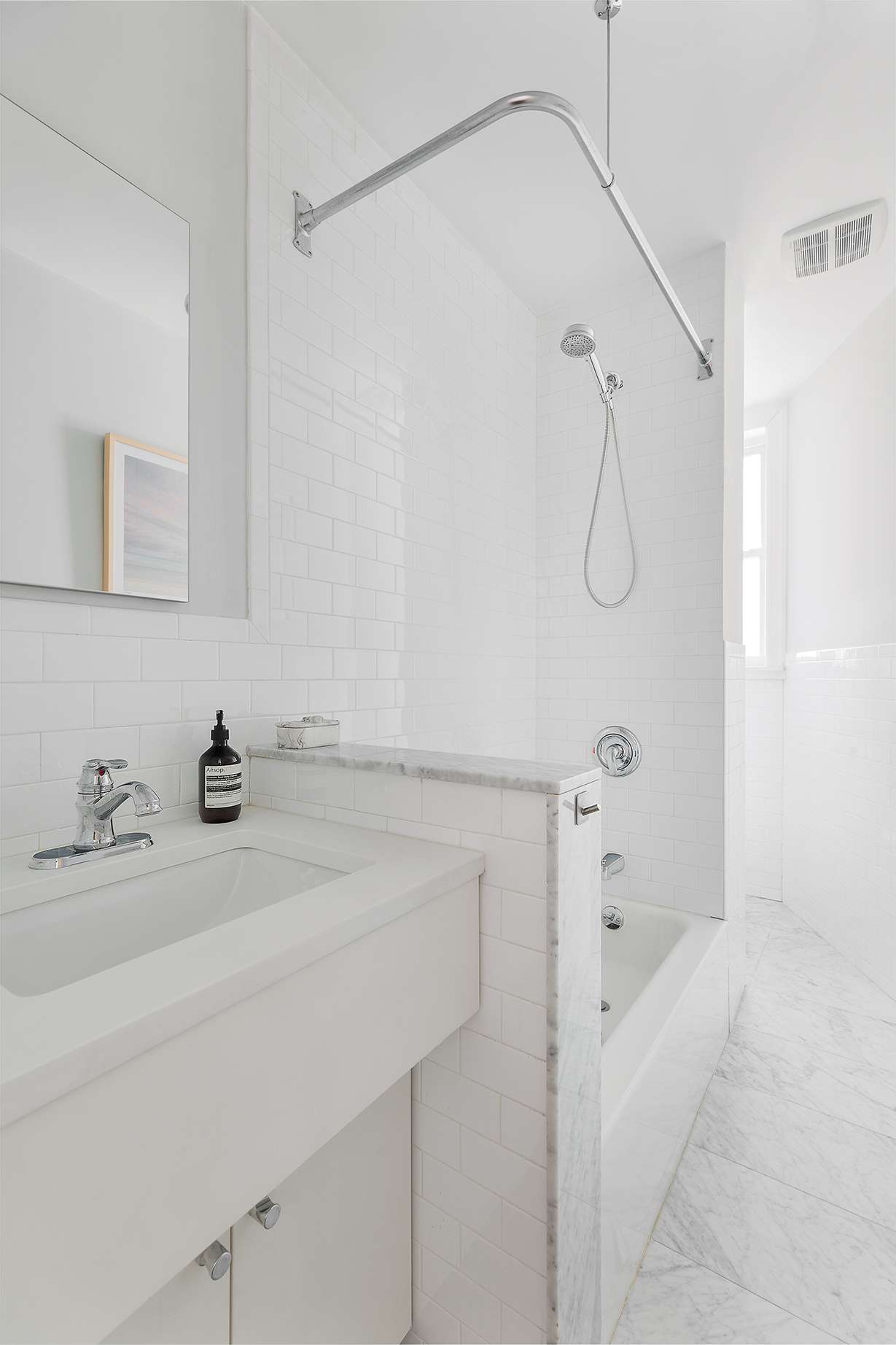 124 Thompson Street, Unit 24 Manhattan, NY 10012 - Photo 6 of 10 a bathroom with a sink and a shower