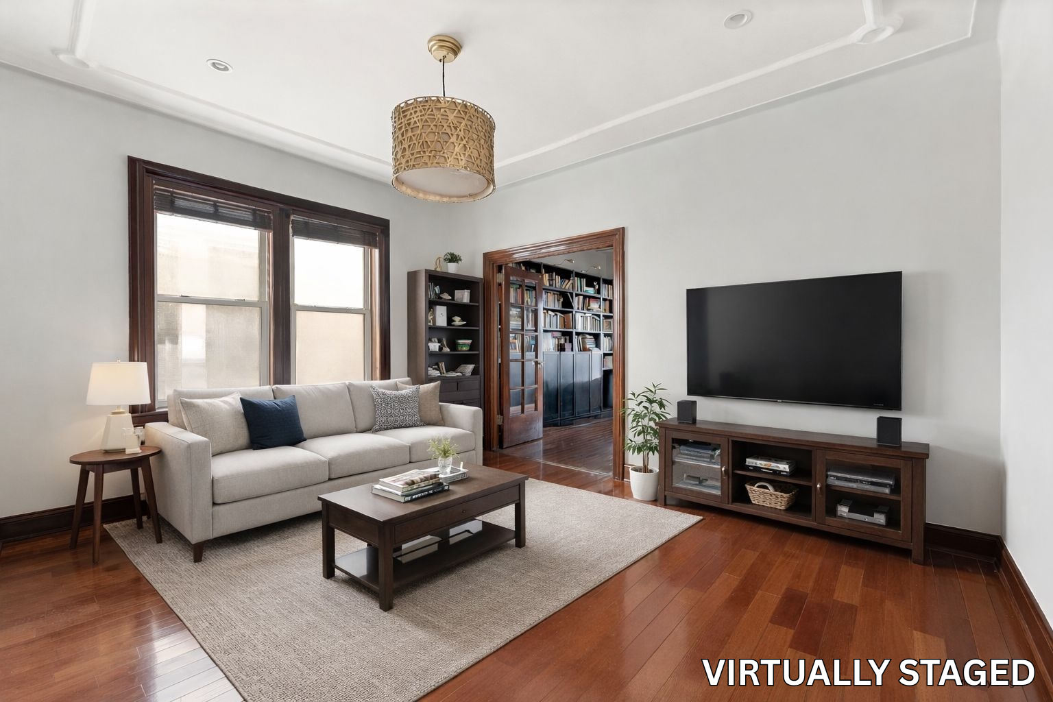 742 44th Street Brooklyn, NY 11220 - Photo 3 of 23 a living room with furniture and a flat screen tv