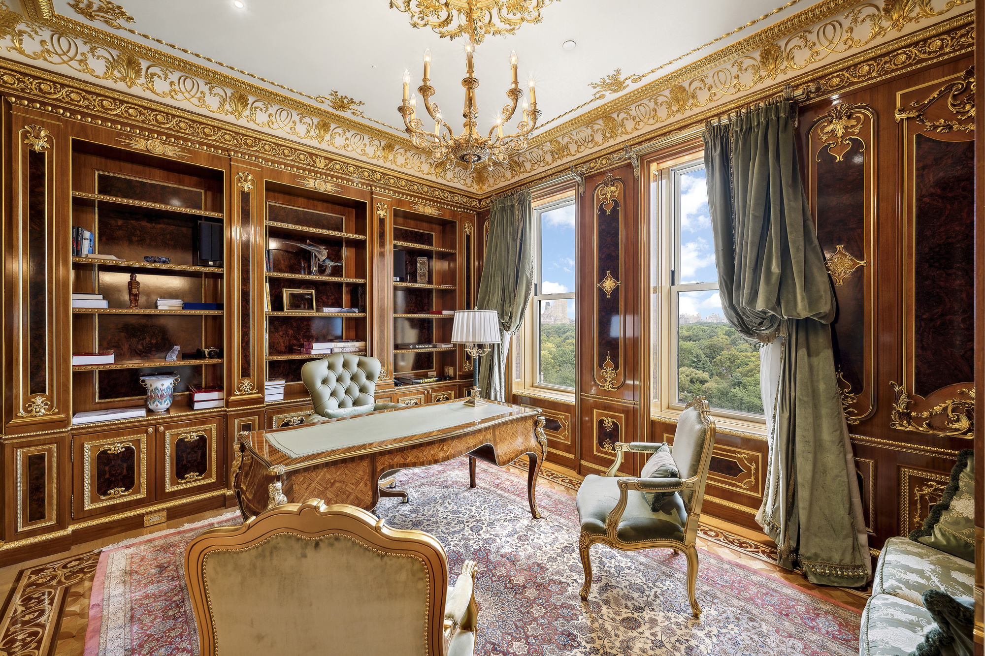 1 Central Park South, Unit 10071009 Manhattan, NY 10019 - Photo 11 of 28 a room with furniture cabinets and a large window