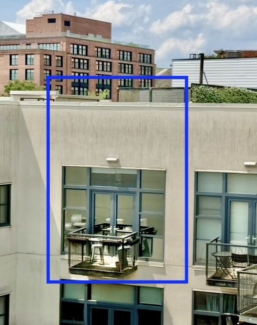 2426 Ontario Road Northwest, Unit 401 Washington, DC 20009 - Photo 18 of 28 a balcony with table and chairs