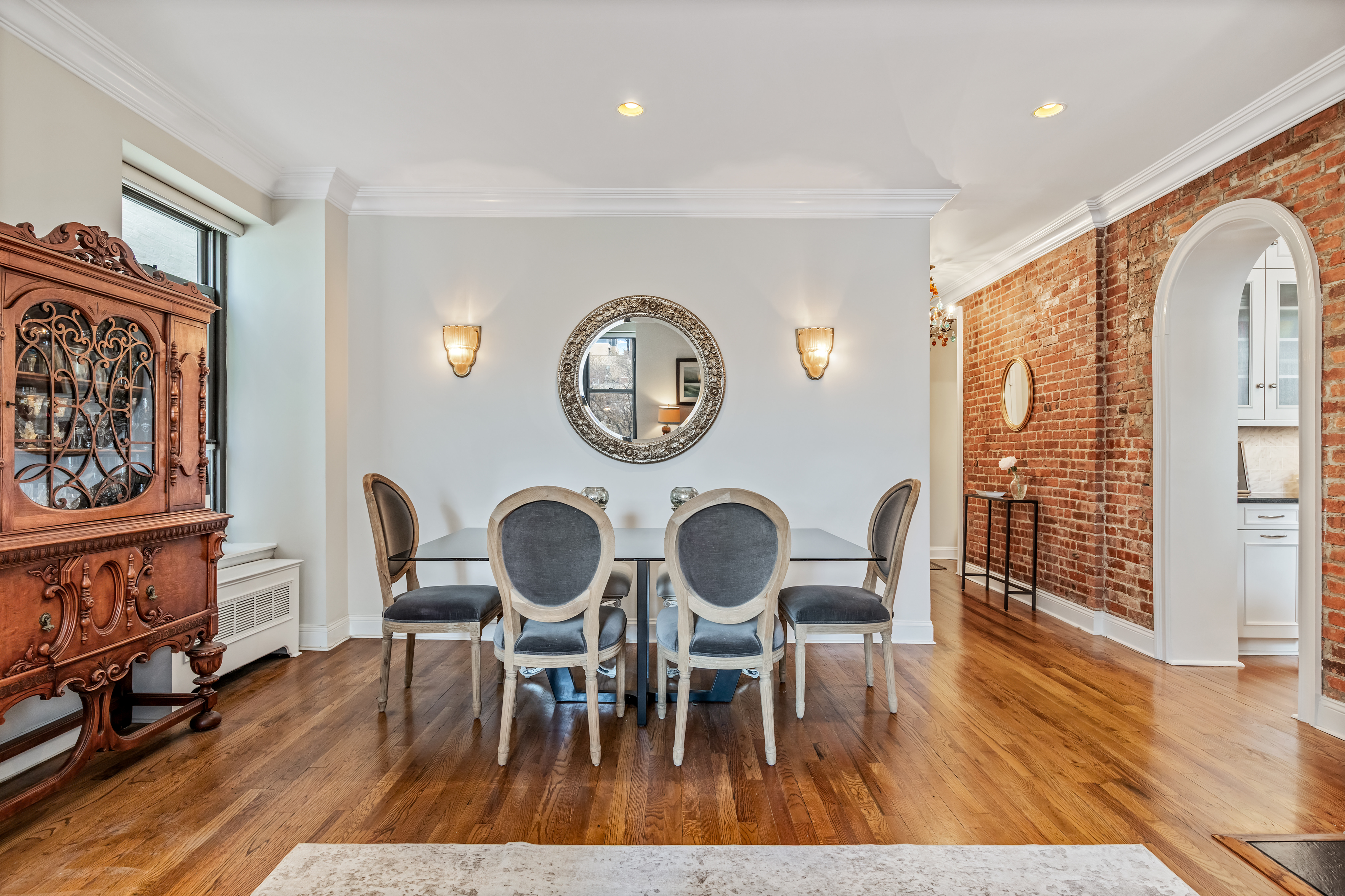 101 West 81st Street, Unit 601 Manhattan, NY 10024 - Photo 2 of 12 a view of a dining room with furniture window and wooden floor