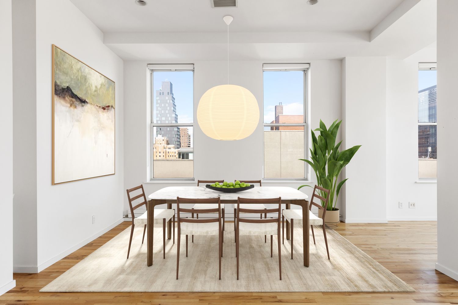 175 East Broadway, Unit 6D Manhattan, NY 10002 - Photo 5 of 18 a view of a dining room with furniture and wooden floor
