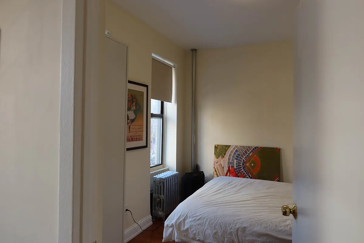 56 Stagg Street, Unit 4 Brooklyn, NY 11206 - Photo 4 of 11 a bedroom with a bed and window