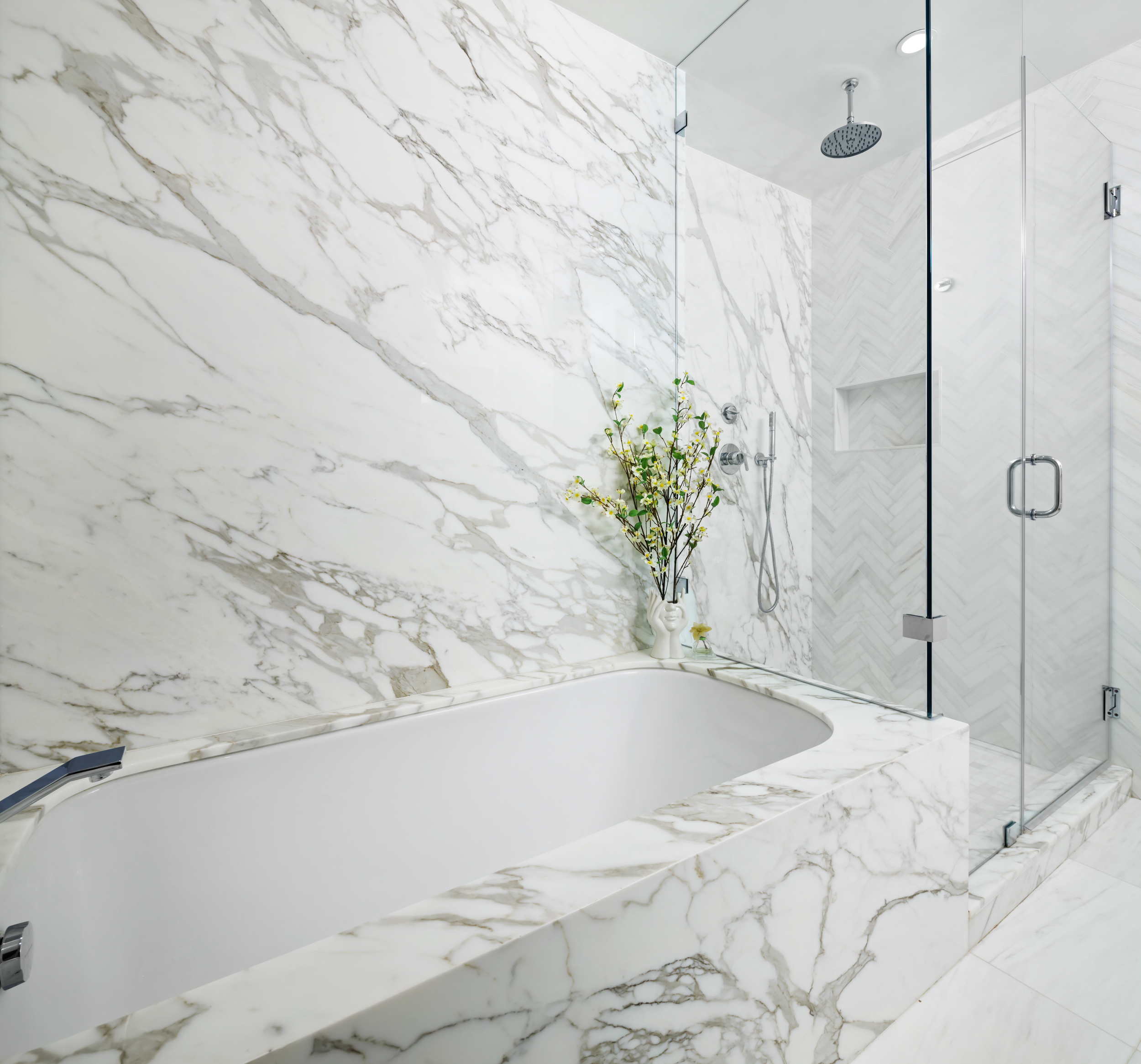 471 Washington Street, Unit 1B Manhattan, NY 10013 - Photo 12 of 16 a white bath tub sitting in a bathroom and shower