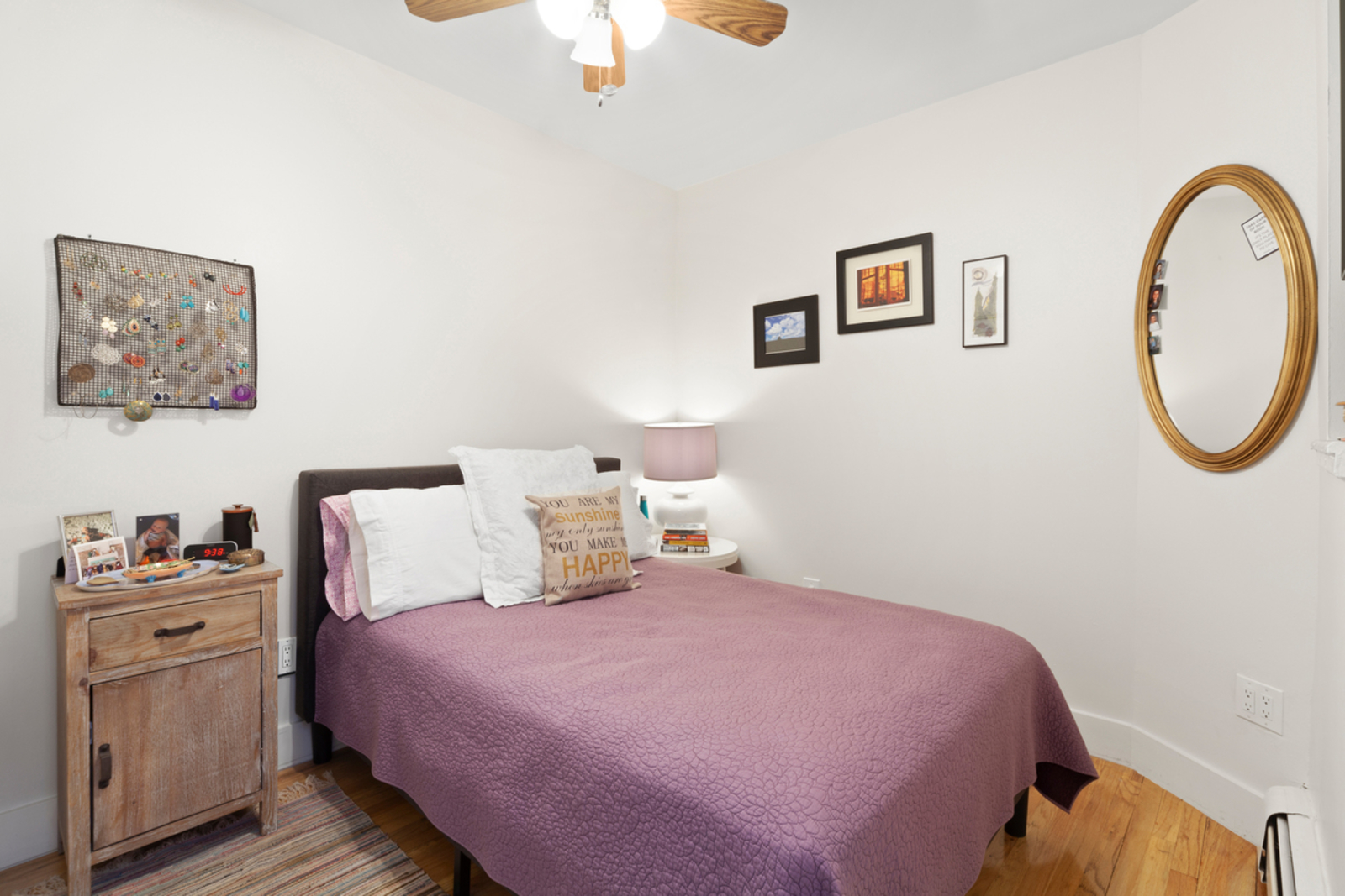 2116 Dorchester Road, Unit 1I Brooklyn, NY 11226 - Photo 6 of 15 a bedroom with a bed and a chandelier