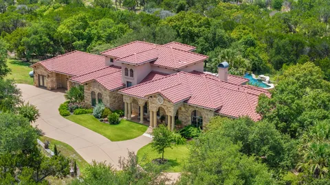 an aerial view of a house with a garden