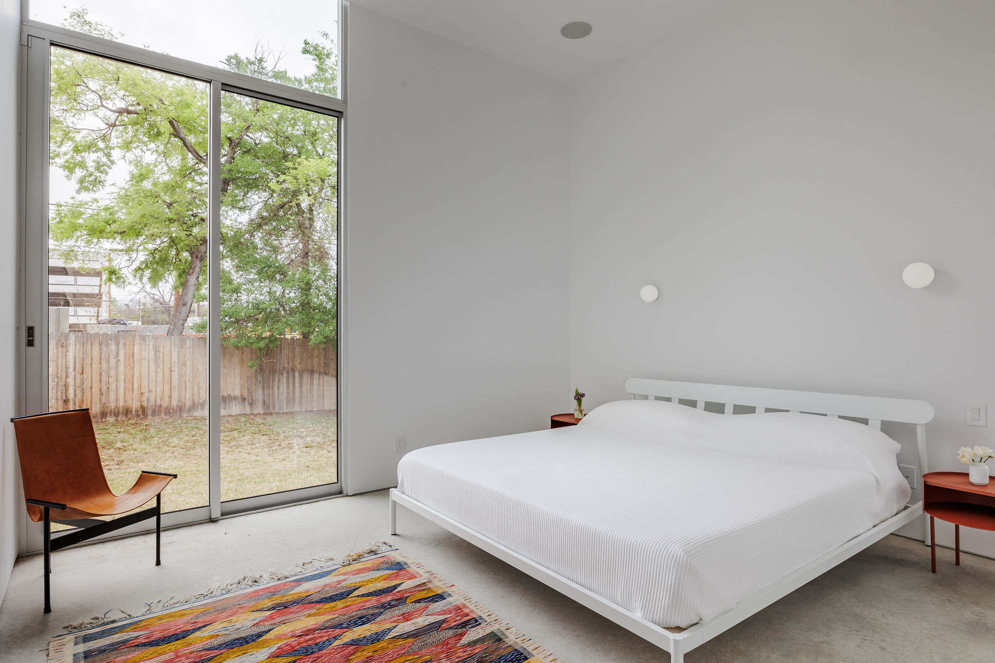 606 West 35th Street Austin, TX 78705 - Photo 22 of 37 a bedroom with a bed and a window