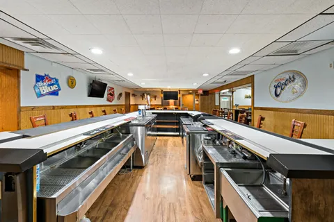 a outdoor dining space with furniture and outdoor view