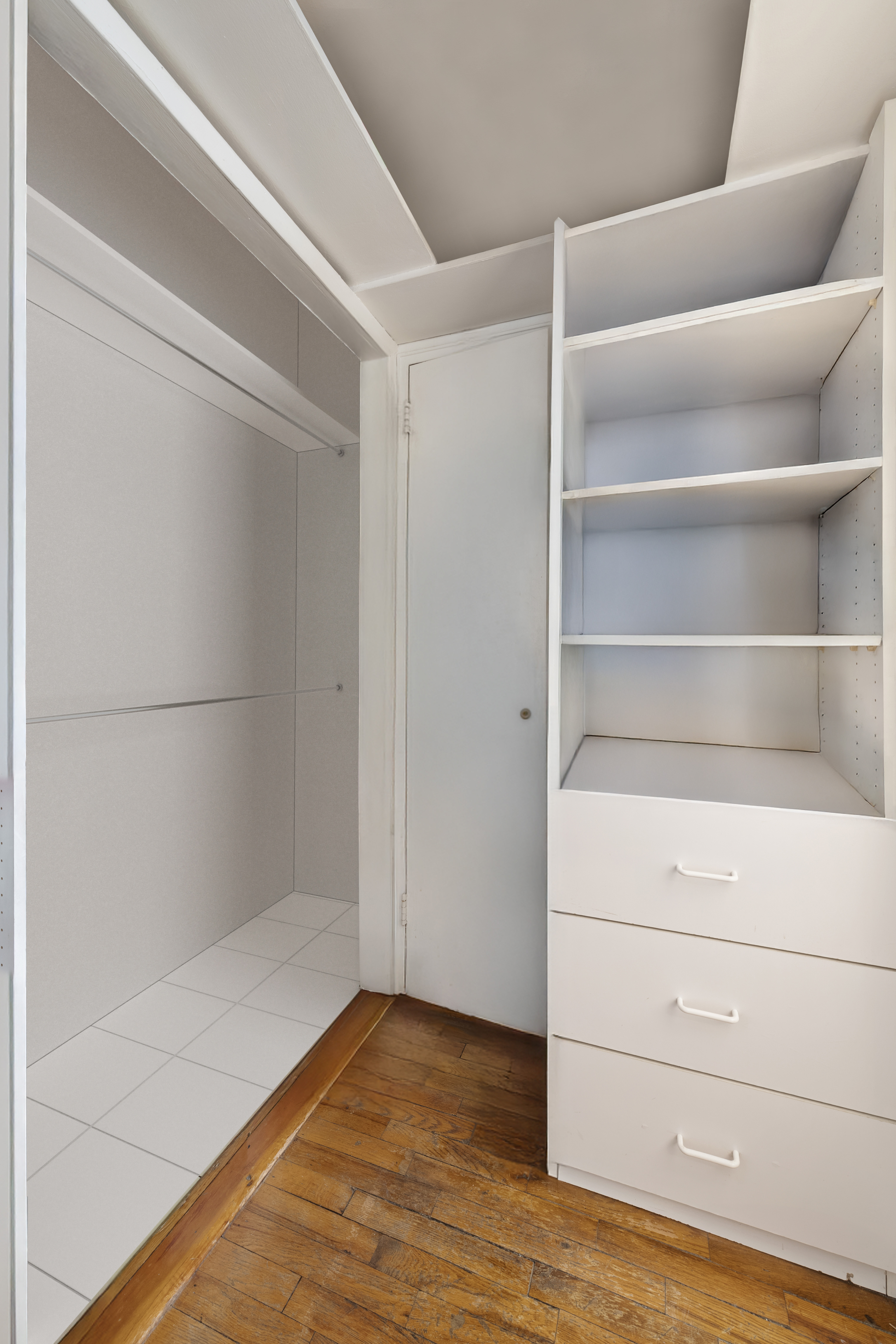 408 West 57th Street, Unit 3A Manhattan, NY 10019 - Photo 5 of 11 a view of walk in closet with empty racks
