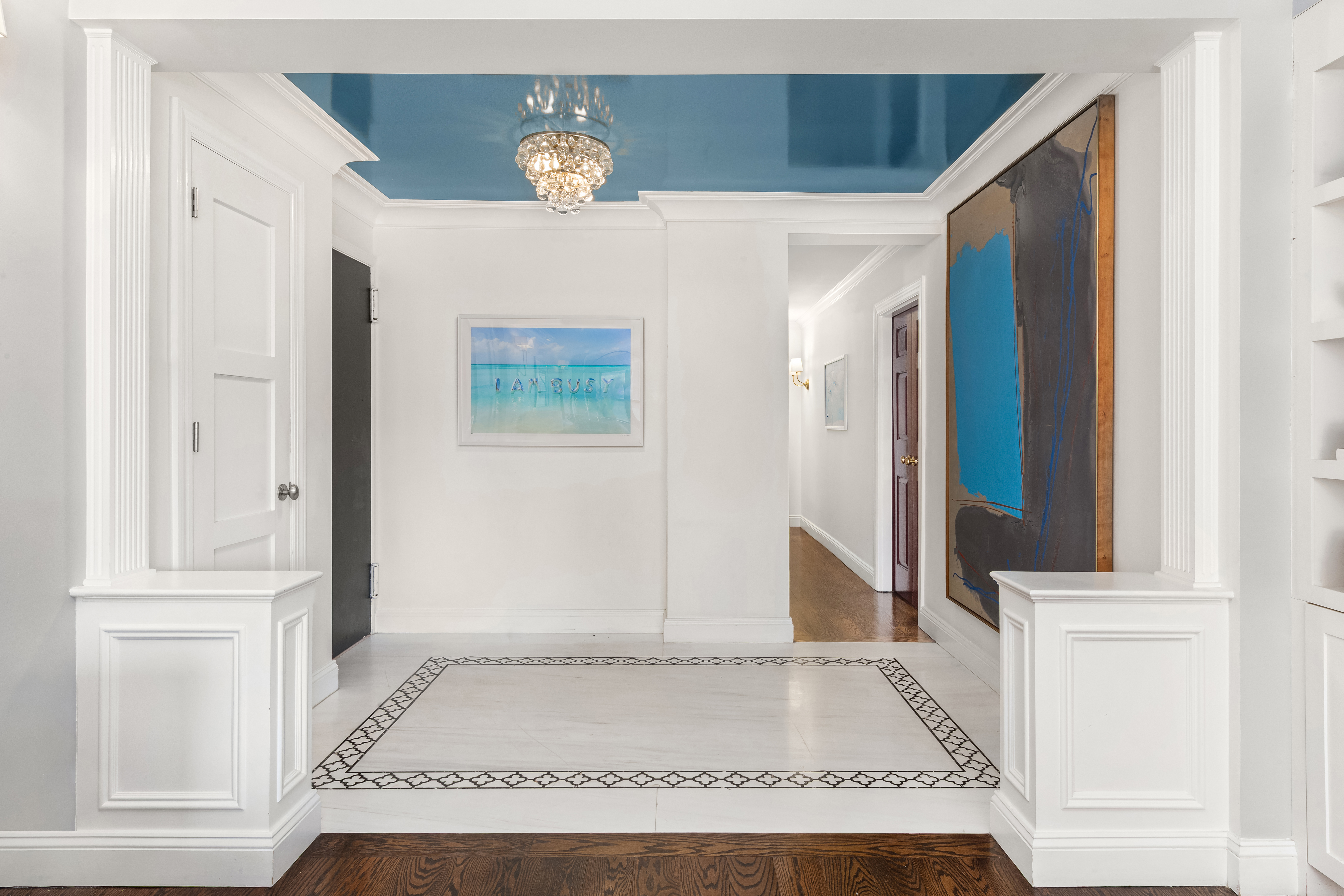 201 East 77th Street, Unit 14AF Manhattan, NY 10075 - Photo 9 of 13 an entryway with wooden floor