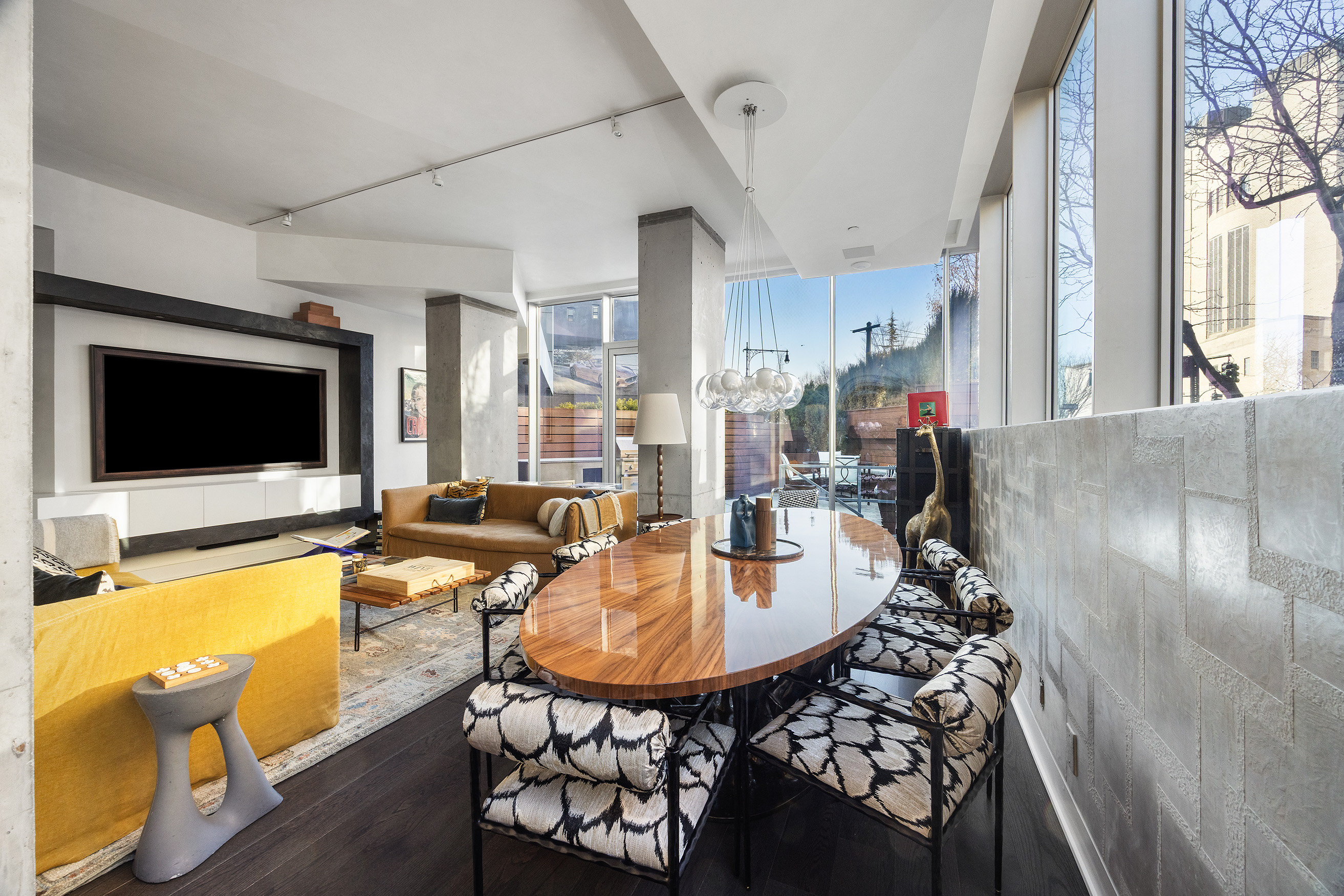 471 Washington Street, Unit THB Manhattan, NY 10013 - Photo 4 of 15 a living room with furniture and a flat screen tv